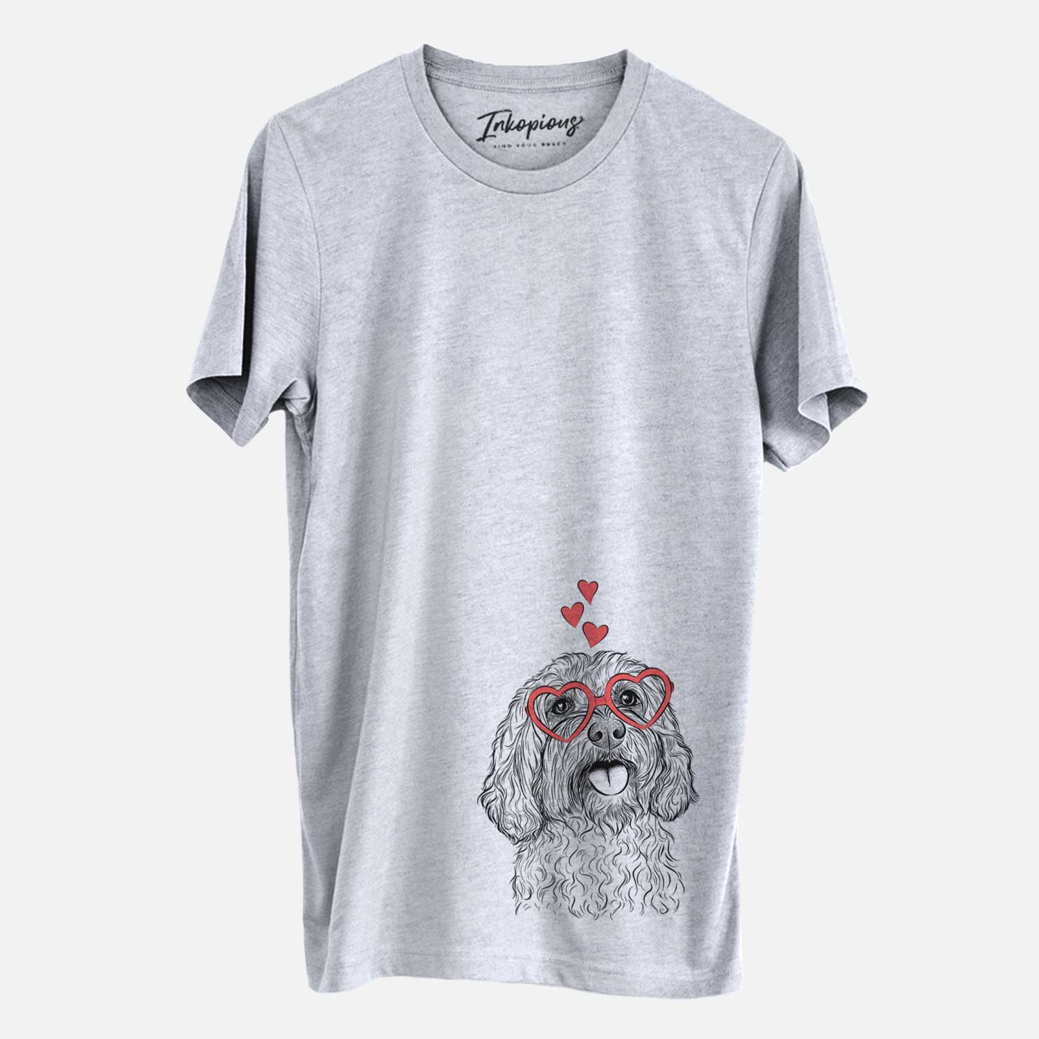 Hand-drawn sketch of Cali the Cavapoo wearing heart-shaped glasses on a Grey Unisex crewneck