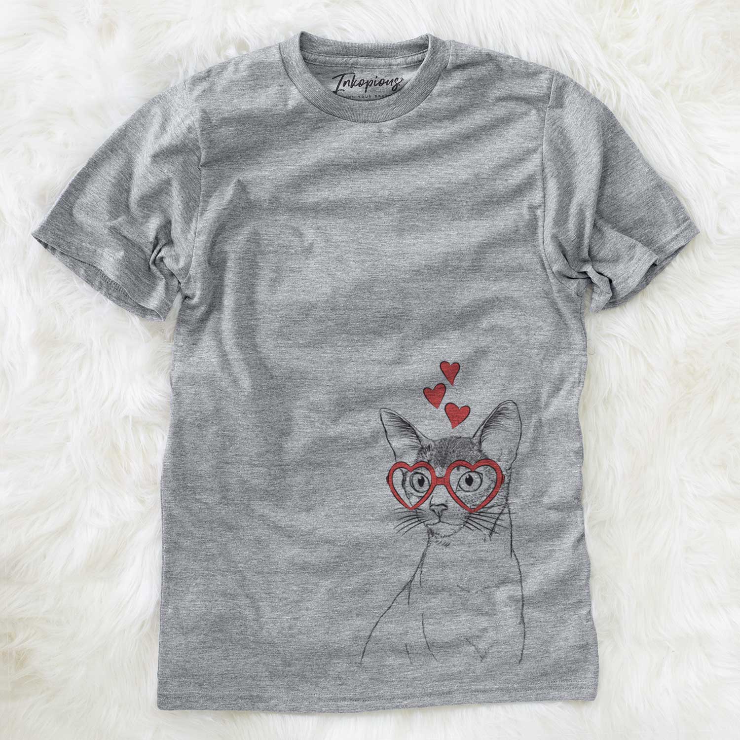 Hand-drawn sketch of Cedric the Abyssinian Cat wearing heart-shaped glasses on a Grey Unisex crewneck
