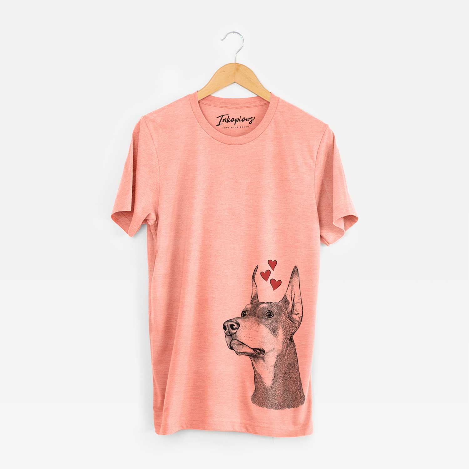 Hand-drawn sketch of Cenza the Doberman Pinscher wearing heart-shaped glasses on a Sunset Unisex crewneck