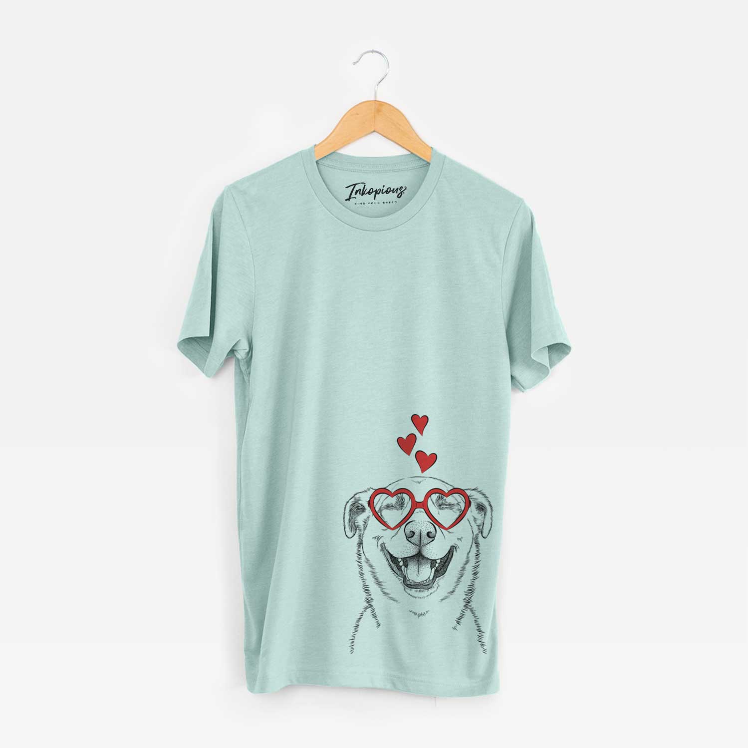 Hand-drawn sketch of Chancellor the Mixed Breed wearing heart-shaped glasses on a Heather Sage Unisex crewneck