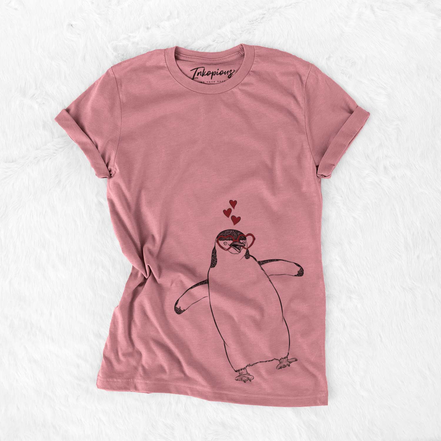 Hand-drawn sketch of Chive the Chinstrap Penguin wearing heart-shaped glasses on a Mauve Bella Canvas Unisex Crewneck