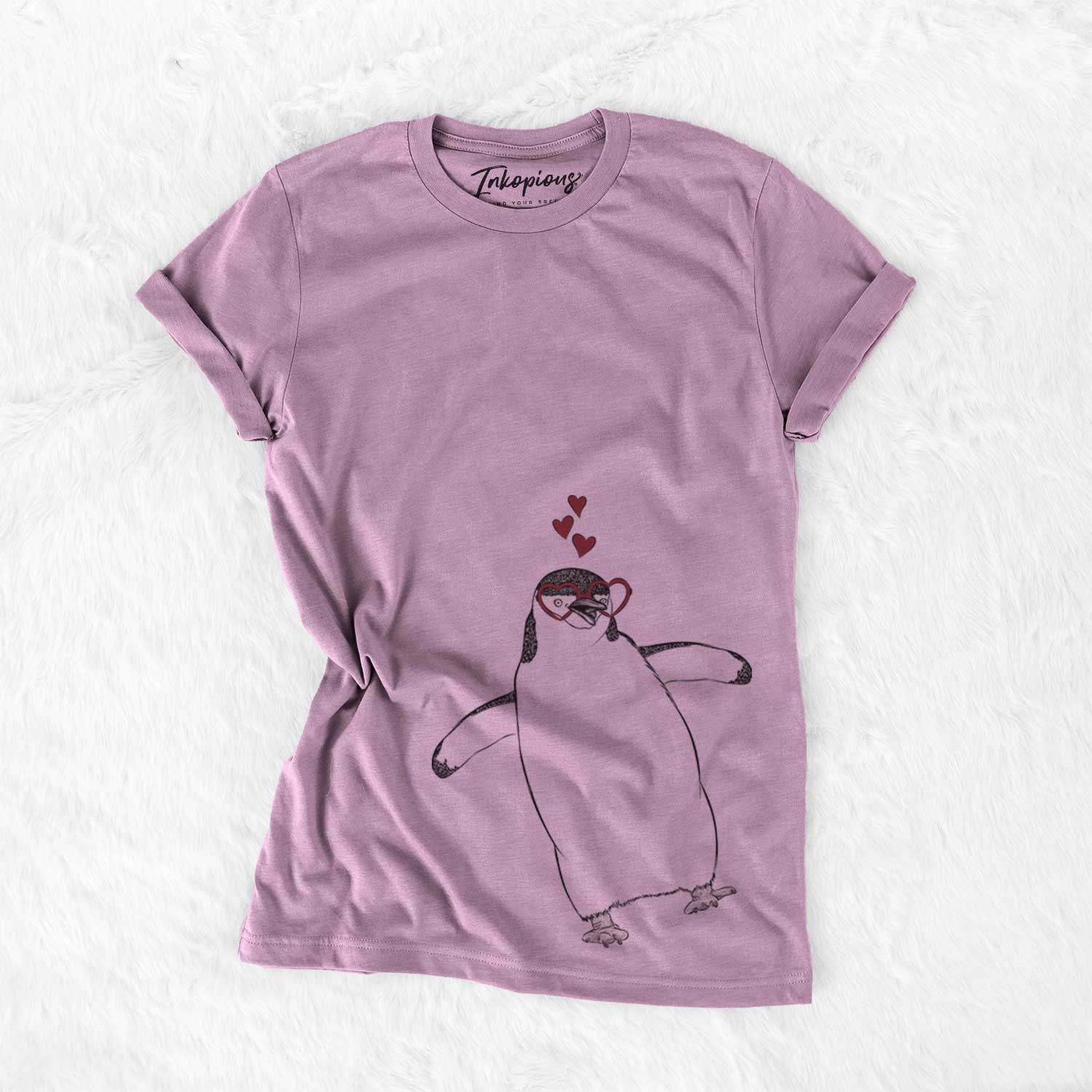 Hand-drawn sketch of Chive the Chinstrap Penguin wearing heart-shaped glasses on an Orchid Bella Canvas Unisex Crewneck
