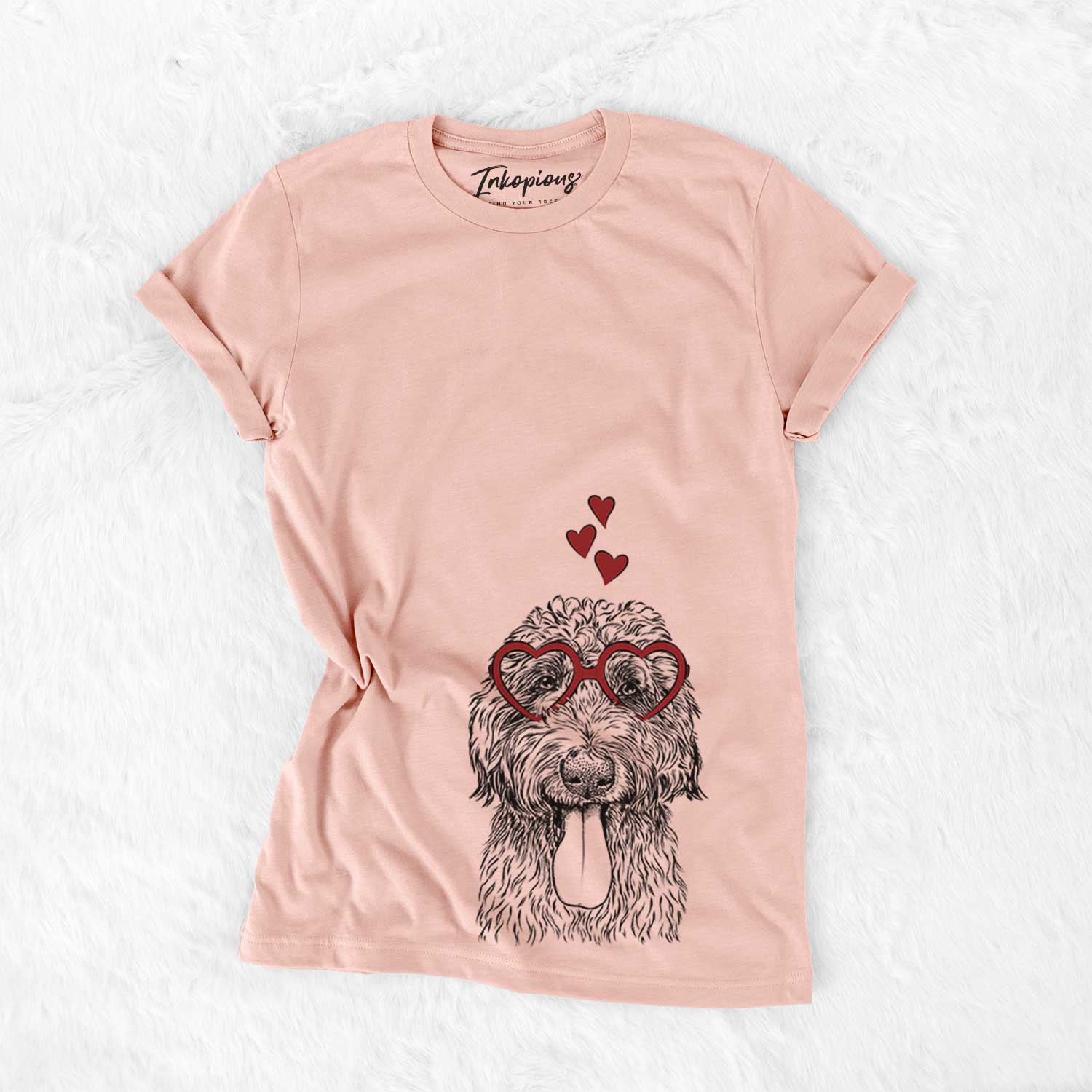 Hand-drawn sketch of CiCi Paulk the Aussiedoodle wearing heart-shaped glasses on a Peach Bella Canvas Unisex Crewneck