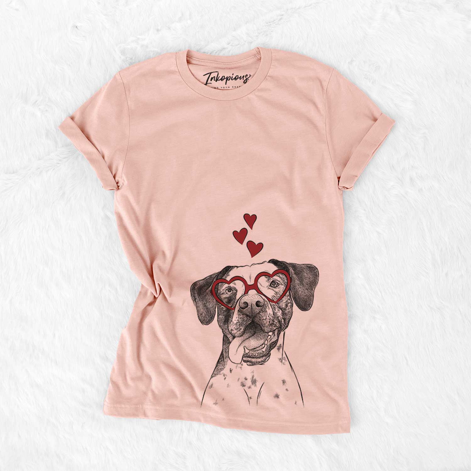 Hand-drawn sketch of Cola the Catahoula wearing heart-shaped glasses on a Peach Bella Canvas Unisex Crewneck