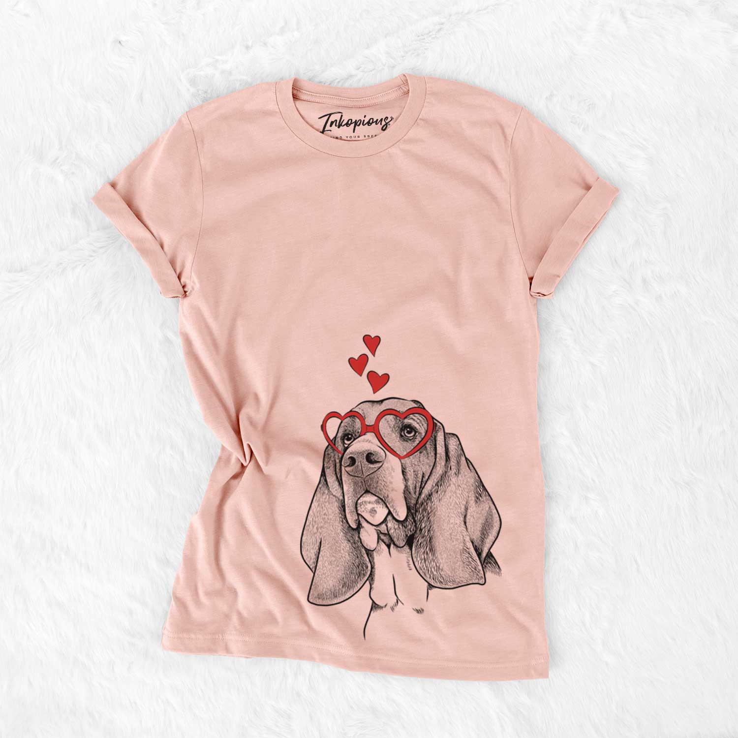 Hand-drawn sketch of Cooper the Basset Hound wearing heart-shaped glasses on a Peach Bella Canvas Unisex Crewneck