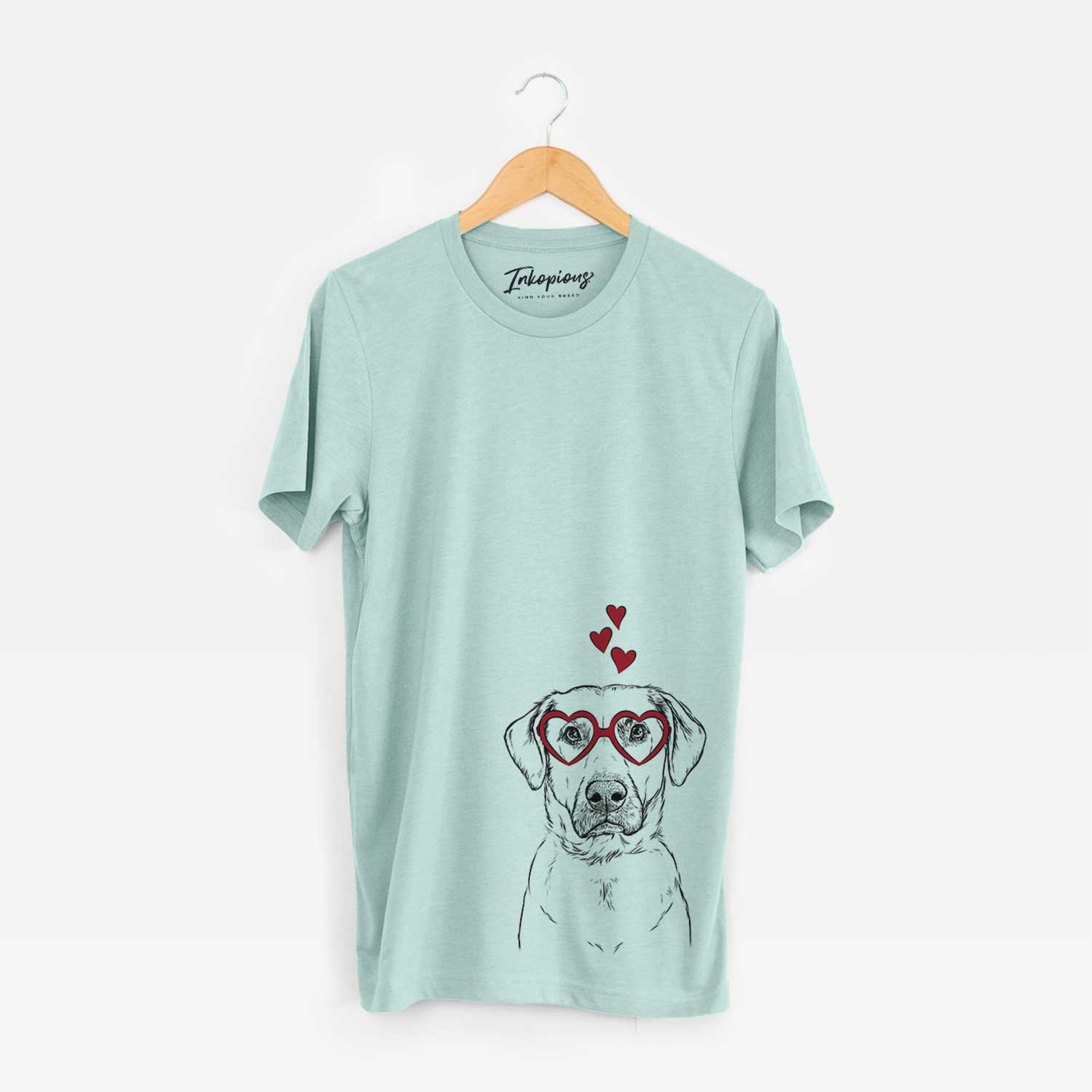 Hand-drawn sketch of Cooper Griffin the Mixed Breed wearing heart-shaped glasses on a Heather Sage Bella Canvas Unisex Crewneck