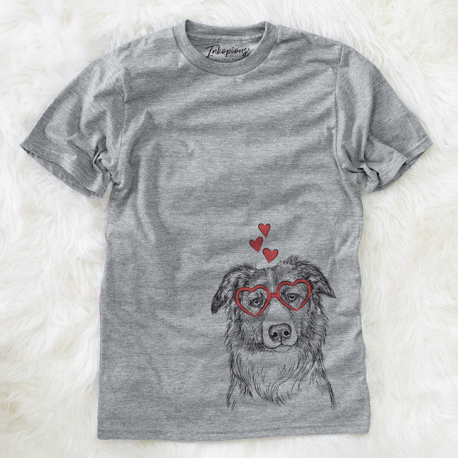 Hand-drawn sketch of Cynder the English Shepherd wearing heart-shaped glasses on a Grey Unisex crewneck