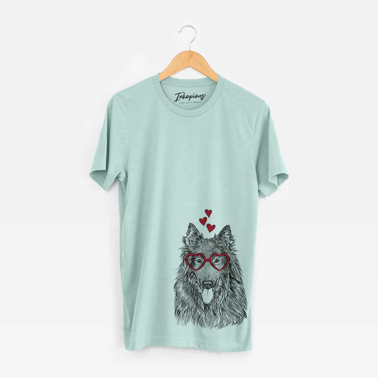 Hand-drawn sketch of Daan the Belgian Shepherd wearing heart-shaped glasses on a Heather Sage Bella Canvas Unisex Crewneck