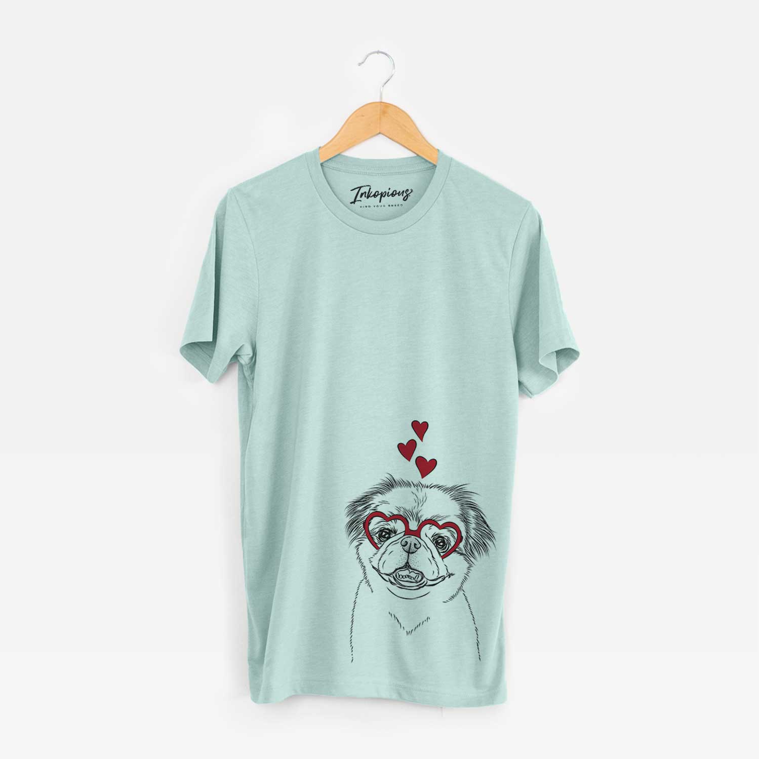 Hand-drawn sketch of Danny the Pekingese wearing heart-shaped glasses on a Heather Sage Bella Canvas Unisex Crewneck