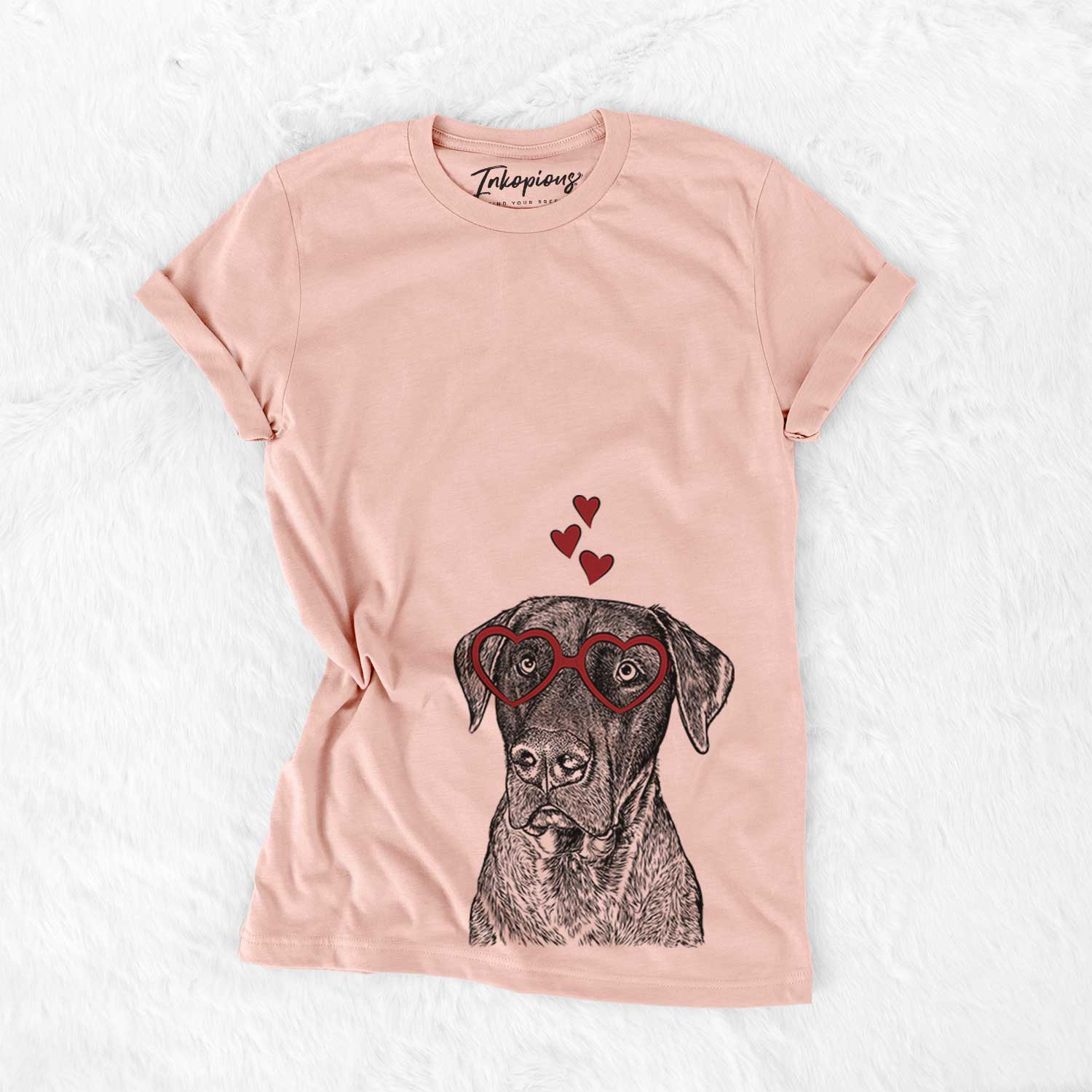 Hand-drawn sketch of David the Boxador wearing heart-shaped glasses on a Peach Bella Canvas Unisex Crewneck