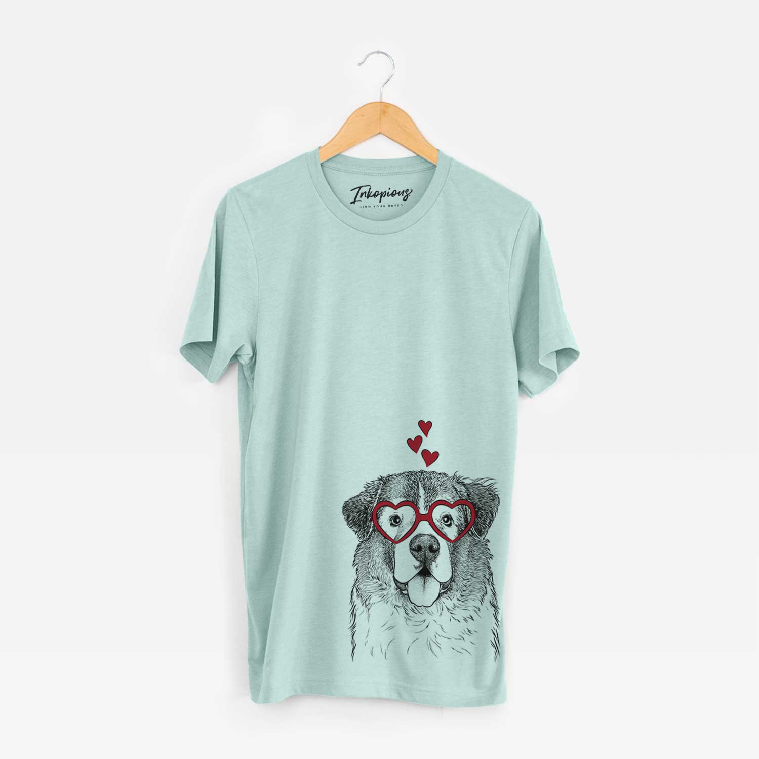 Hand-drawn sketch of Dilly the Saint Bernard wearing heart-shaped glasses on a Heather Sage Bella Canvas Unisex Crewneck