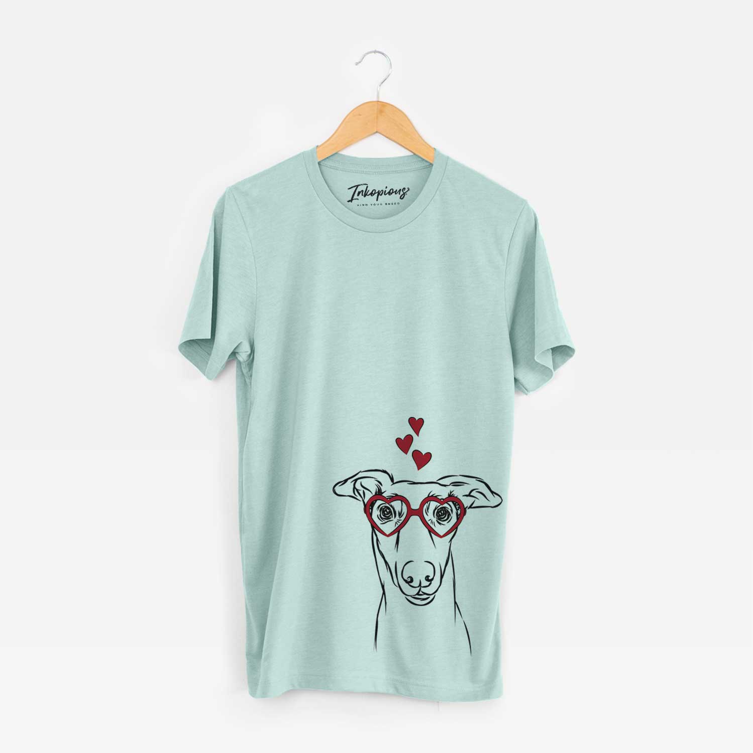 Hand-drawn sketch of Diva the Greyhound wearing heart-shaped glasses on a Heather Sage Bella Canvas Unisex Crewneck