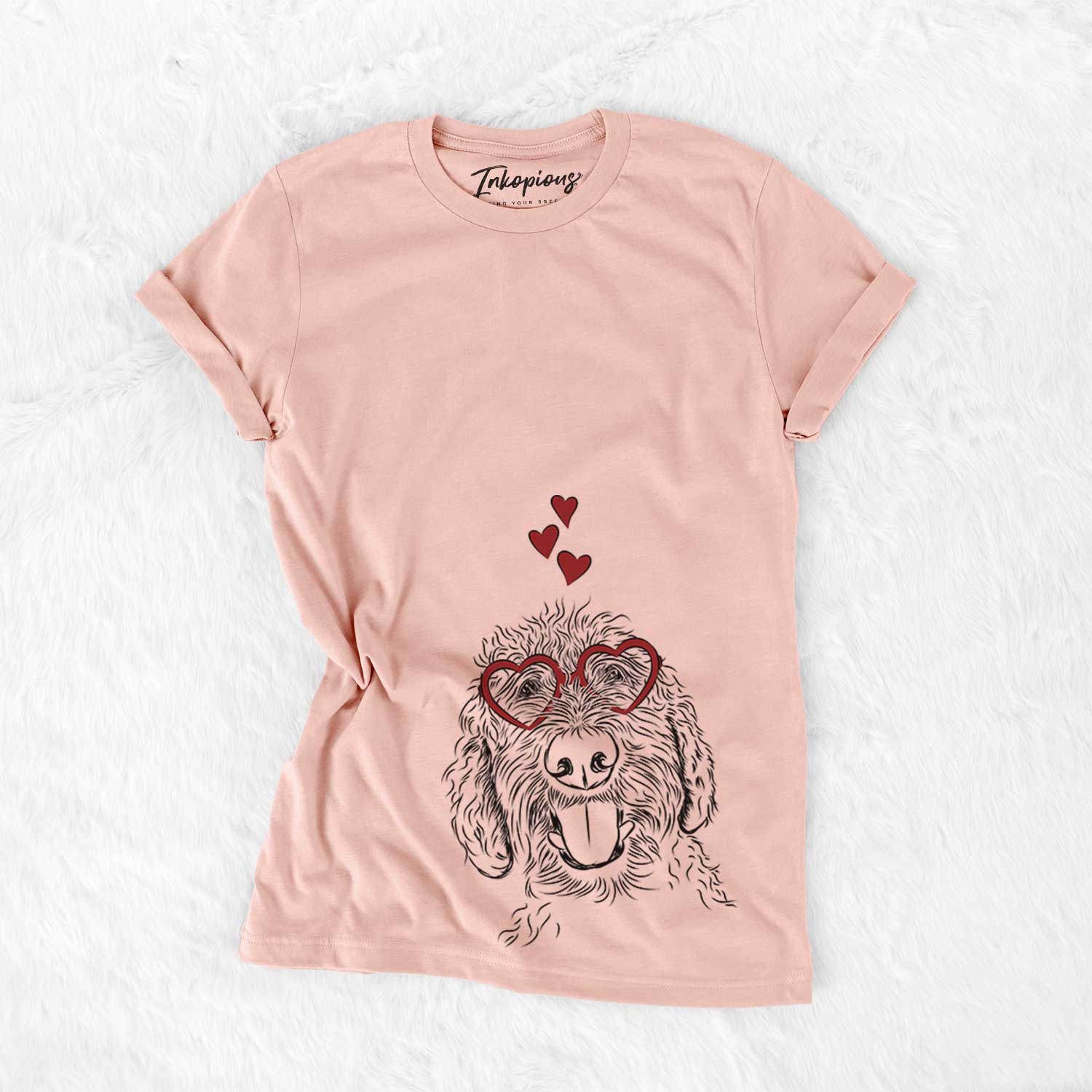 Hand-drawn sketch of Dixie the Doodle wearing heart-shaped glasses on a Peach Bella Canvas Unisex Crewneck