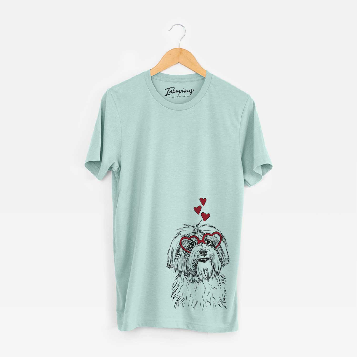 Hand-drawn sketch of Dooley the Havanese wearing heart-shaped glasses on a Heather Sage Bella Canvas Unisex Crewneck