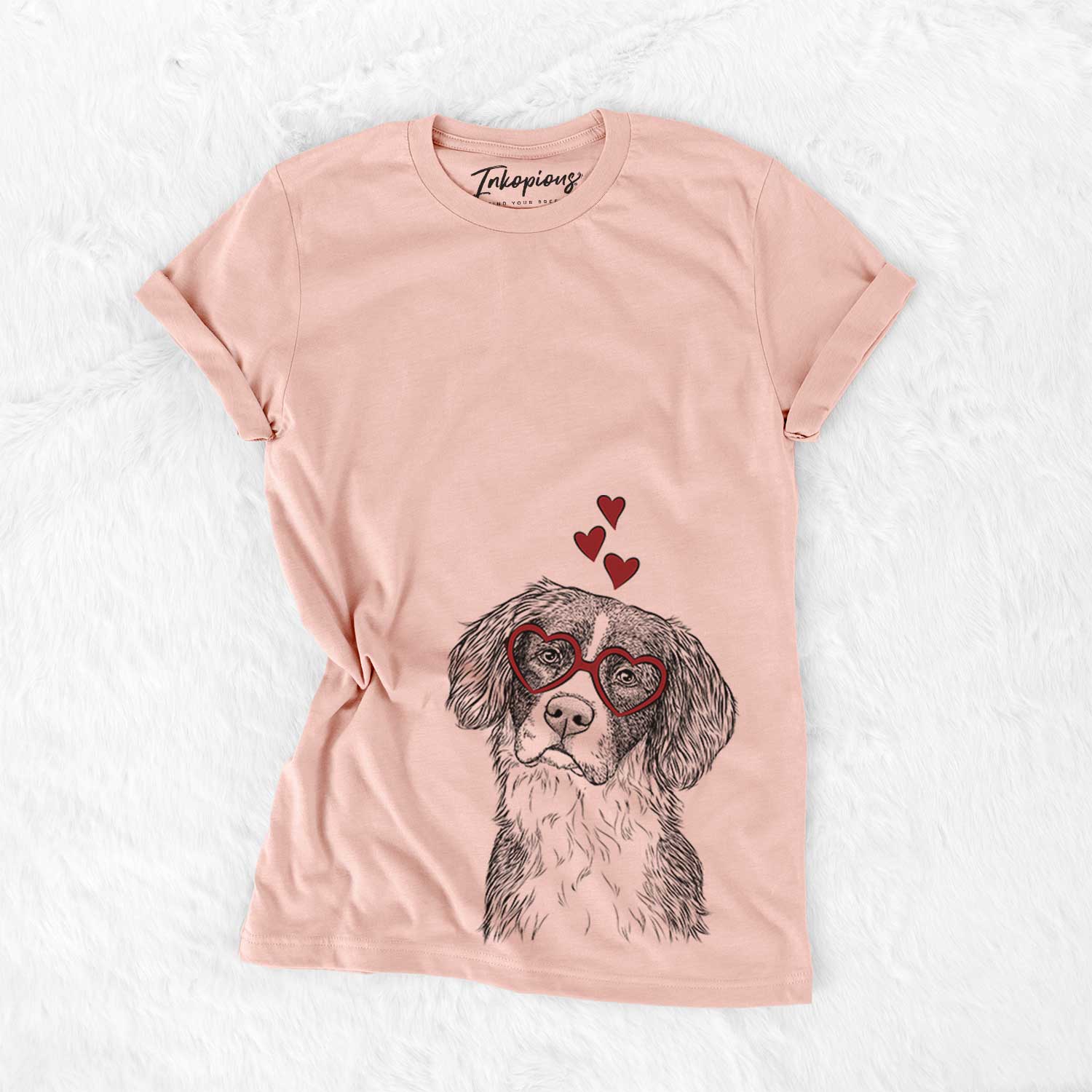 Hand-drawn sketch of Dulce the Drentsche Patrijshond wearing heart-shaped glasses on a Peach Bella Canvas Unisex Crewneck