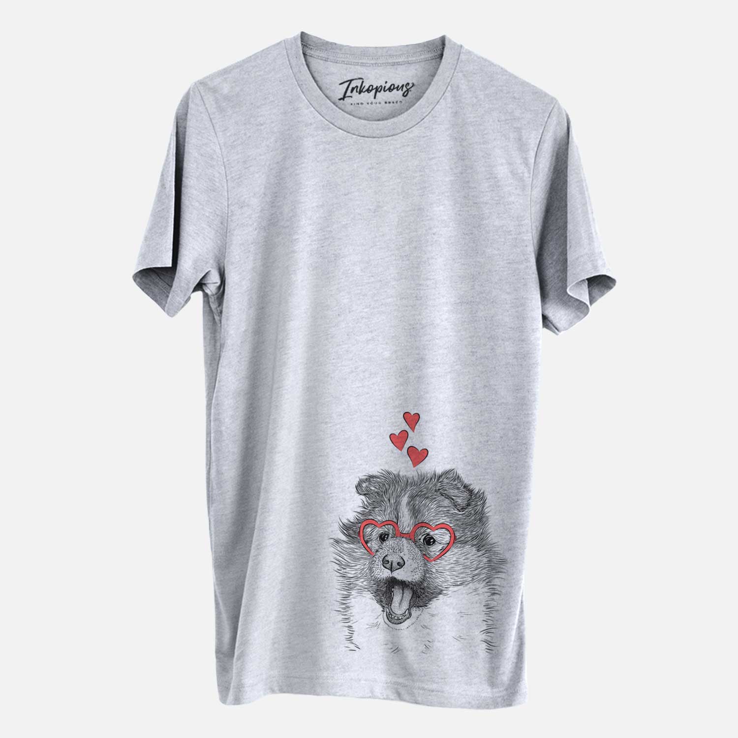 Hand-drawn sketch of Dylan the Shetland Sheepdog wearing heart-shaped glasses on a Grey Unisex crewneck
