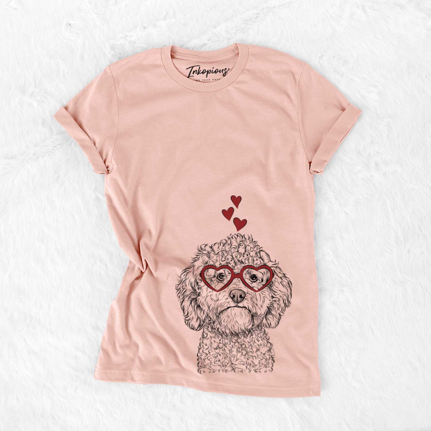 Hand-drawn sketch of Edgar the Shihpoo wearing heart-shaped glasses on a Peach Bella Canvas Unisex Crewneck