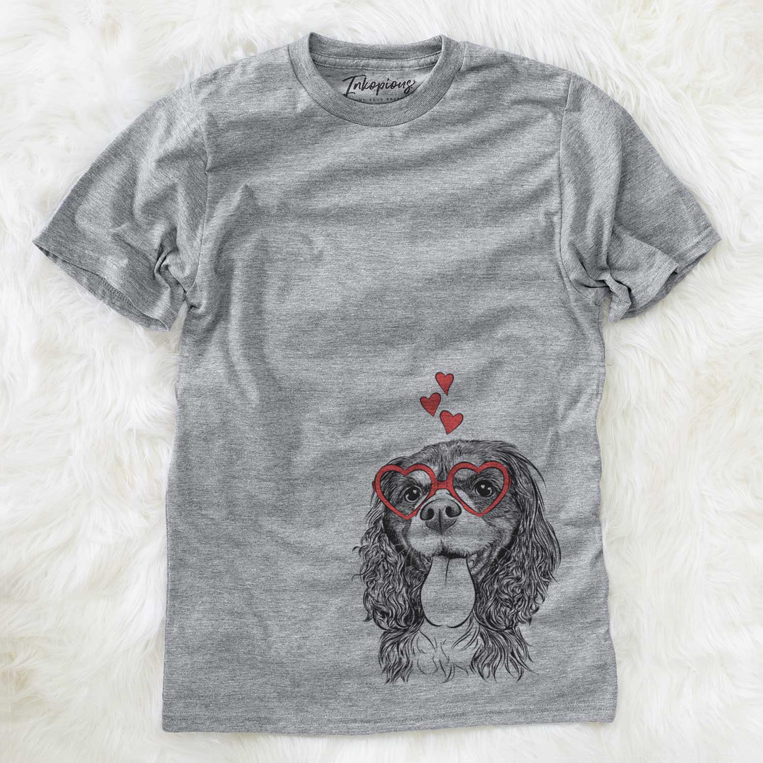 Hand-drawn sketch of Elizabeth the Cavalier King Charles Spaniel wearing heart-shaped glasses on a Grey Unisex crewneck