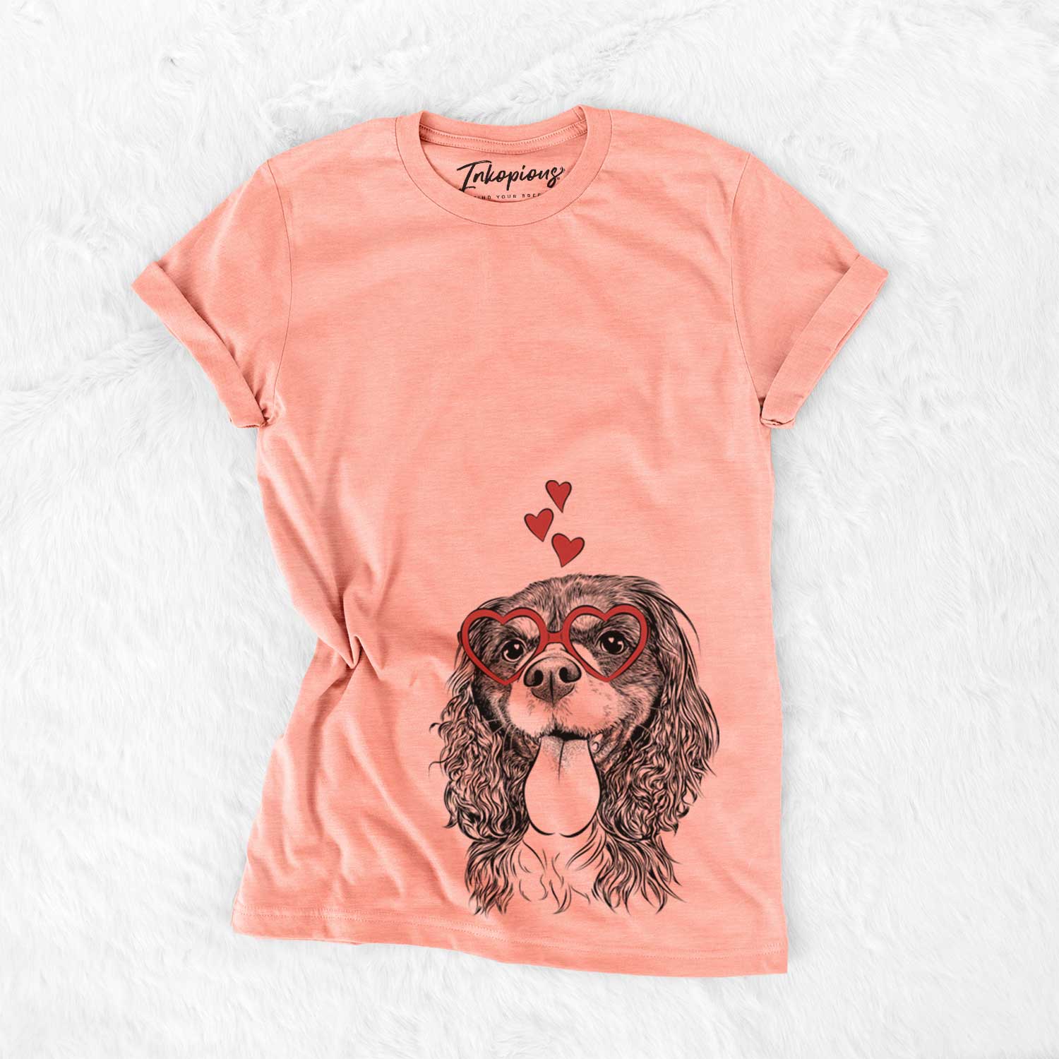 Hand-drawn sketch of Elizabeth the Cavalier King Charles Spaniel wearing heart-shaped glasses on a Sunset Bella Canvas Unisex Crewneck
