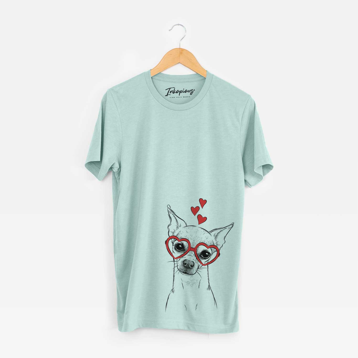 Hand-drawn sketch of Emee the Chihuahua wearing heart-shaped glasses on a Heather Sage Bella Canvas Unisex Crewneck
