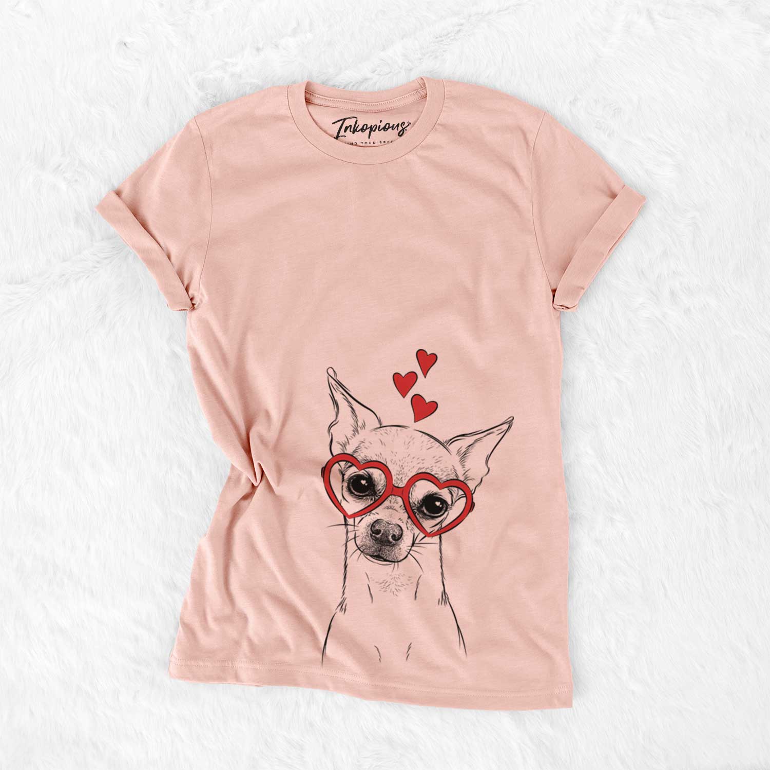 Hand-drawn sketch of Emee the Chihuahua wearing heart-shaped glasses on a Peach Bella Canvas Unisex Crewneck