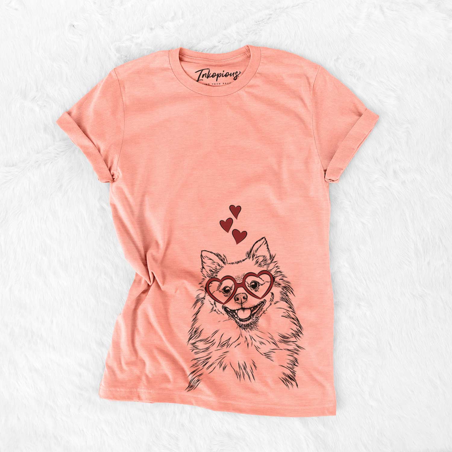 Hand-drawn sketch of Fibi the Spitz wearing heart-shaped glasses on a Sunset Bella Canvas Unisex Crewneck