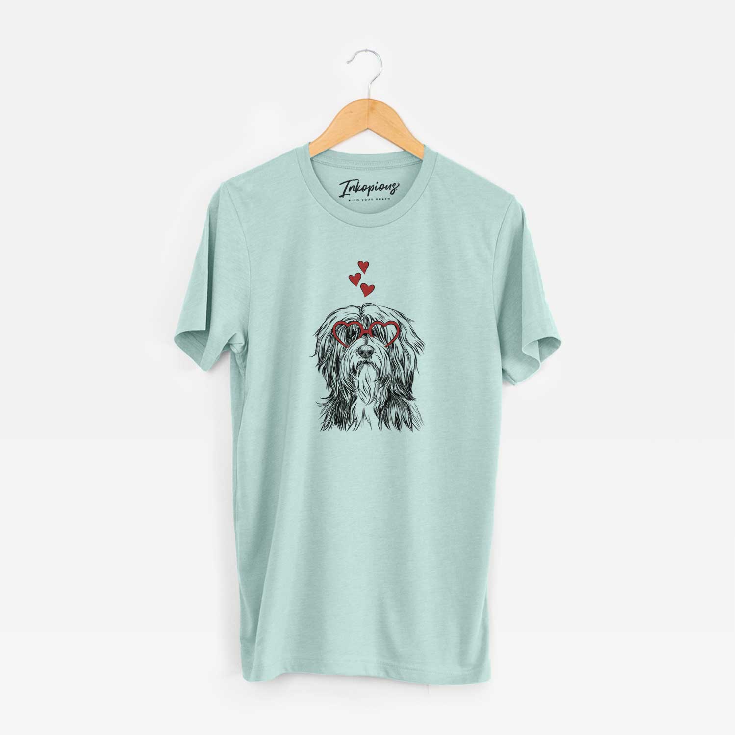 Hand-drawn sketch of Fiji the Polish Lowland Sheepdog wearing heart-shaped glasses on a Heather Sage Unisex crewneck