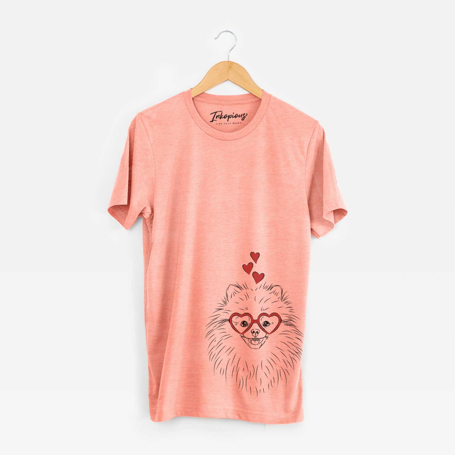 Hand-drawn sketch of Finn the Pomeranian wearing heart-shaped glasses on a Sunset Unisex crewneck