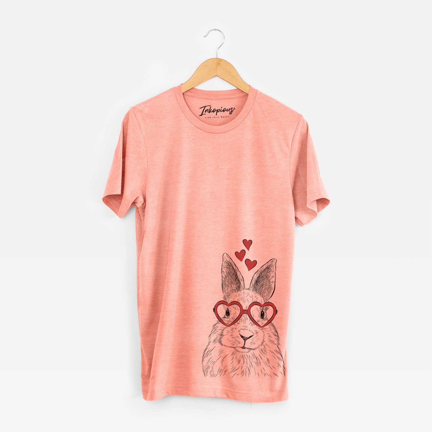 Hand-drawn sketch of Flower the Rex Rabbit wearing heart-shaped glasses on a Sunset Unisex crewneck