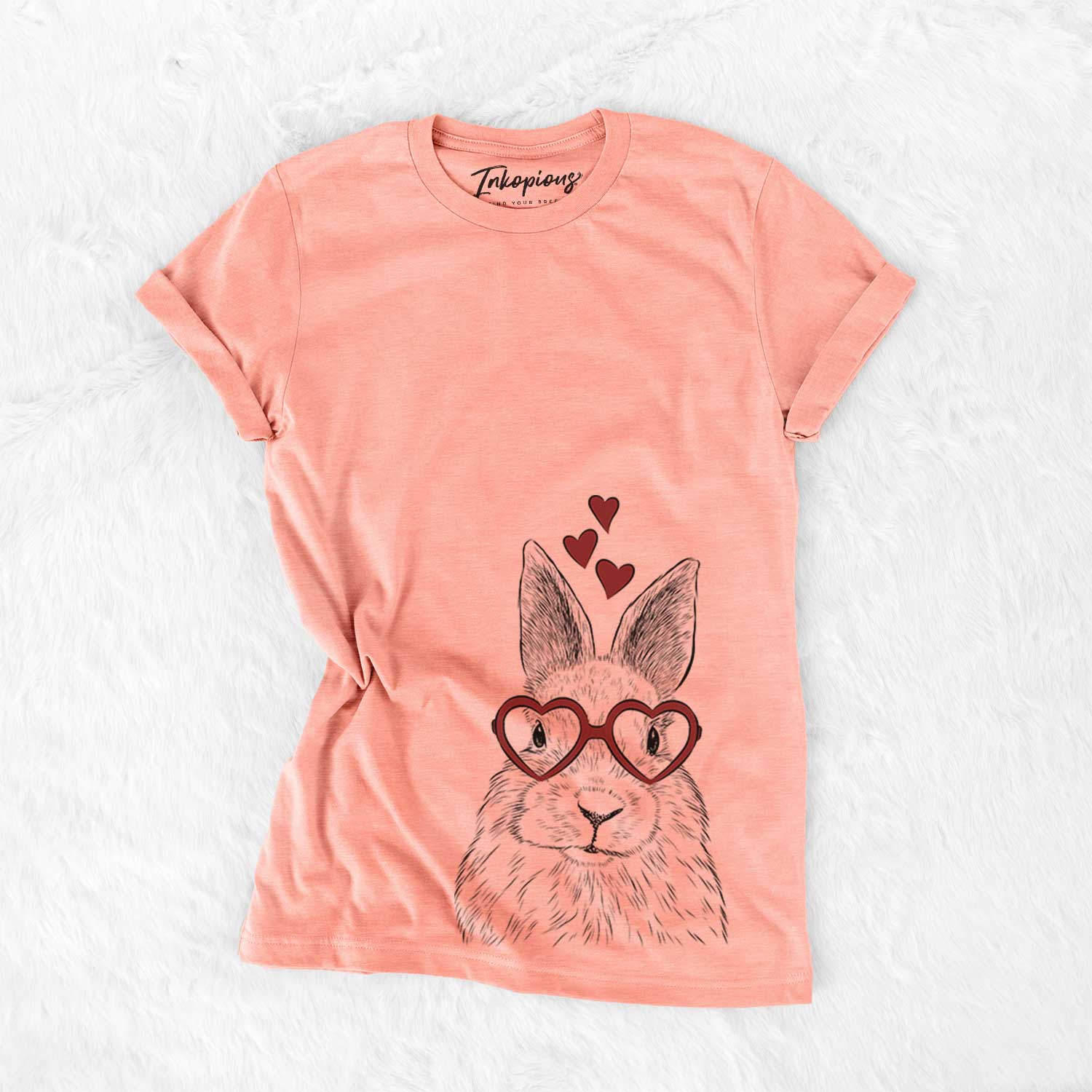 Hand-drawn sketch of Flower the Rex Rabbit wearing heart-shaped glasses on a Sunset Bella Canvas Unisex Crewneck