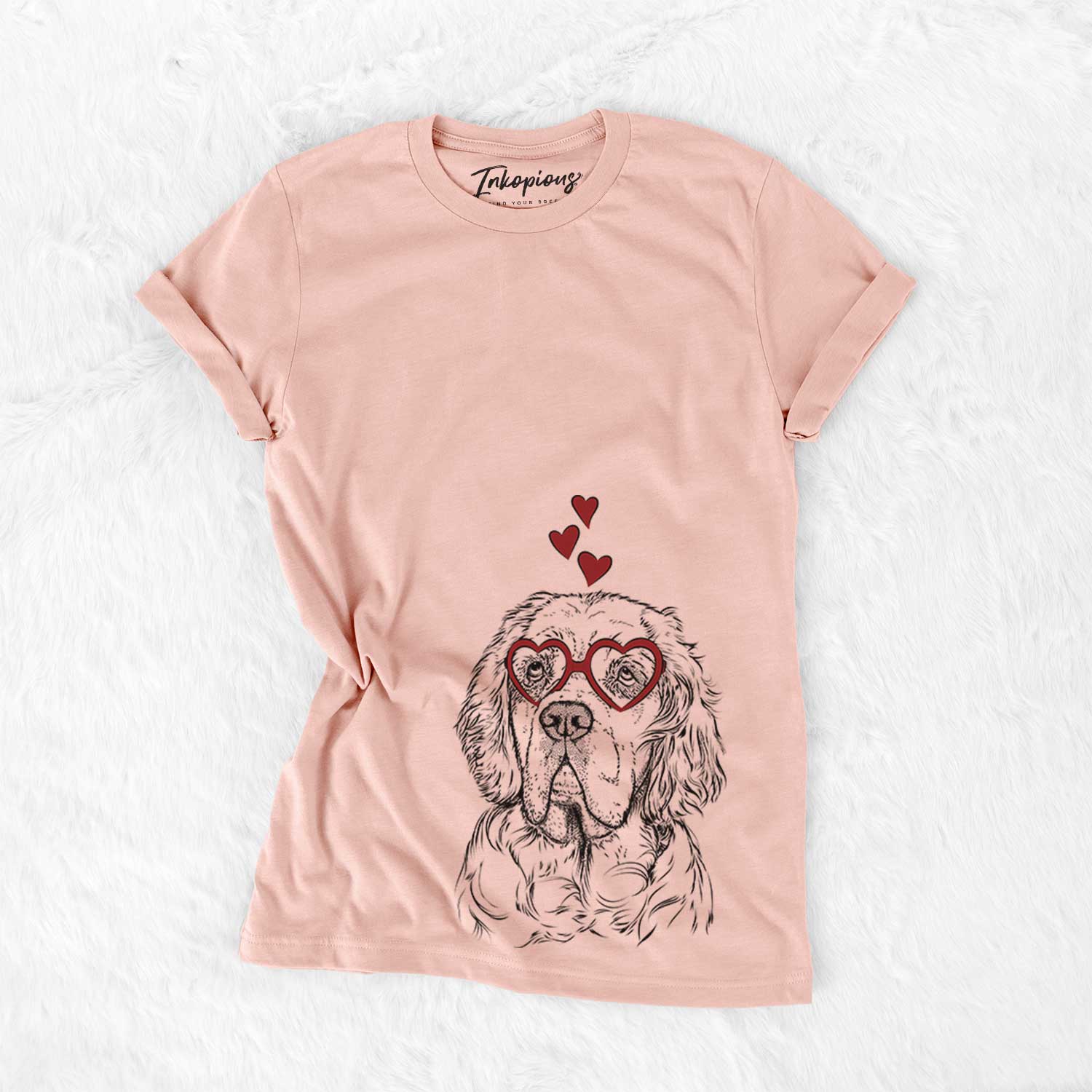 Hand-drawn sketch of Gary the Clumber Spaniel wearing heart-shaped glasses on a Peach Bella Canvas Unisex Crewneck