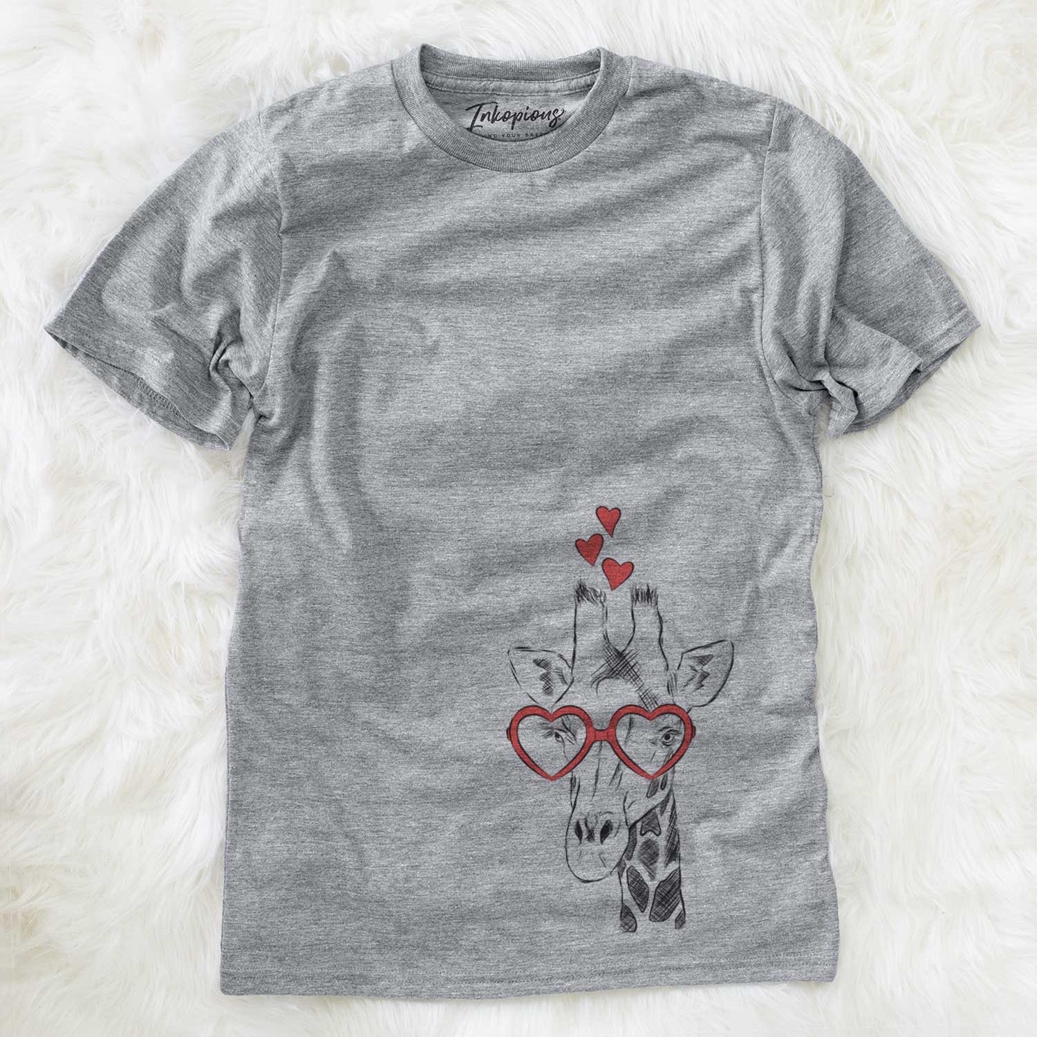 Hand-drawn sketch of Geoffrey the Giraffe wearing heart-shaped glasses on a Grey Unisex crewneck
