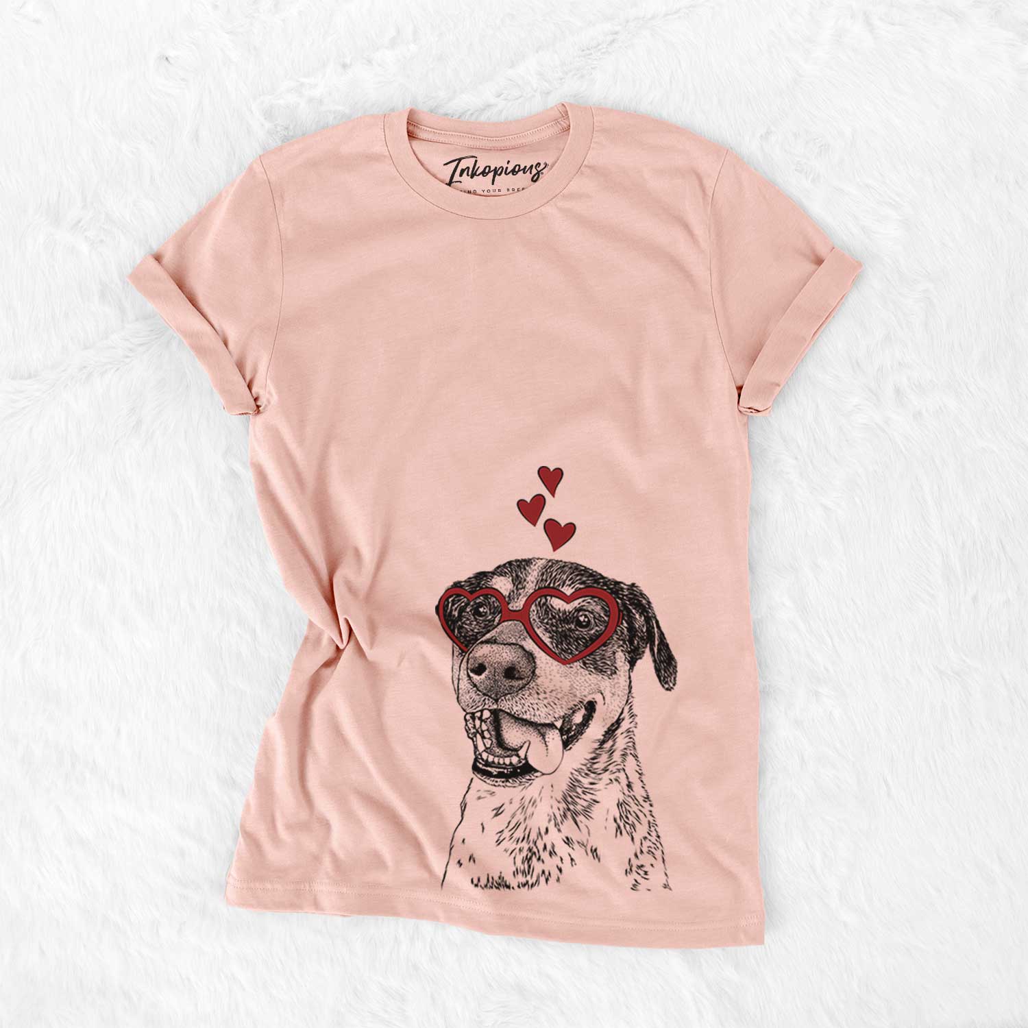Hand-drawn sketch of Gerti the Mixed Breed wearing heart-shaped glasses on a Peach Bella Canvas Unisex Crewneck