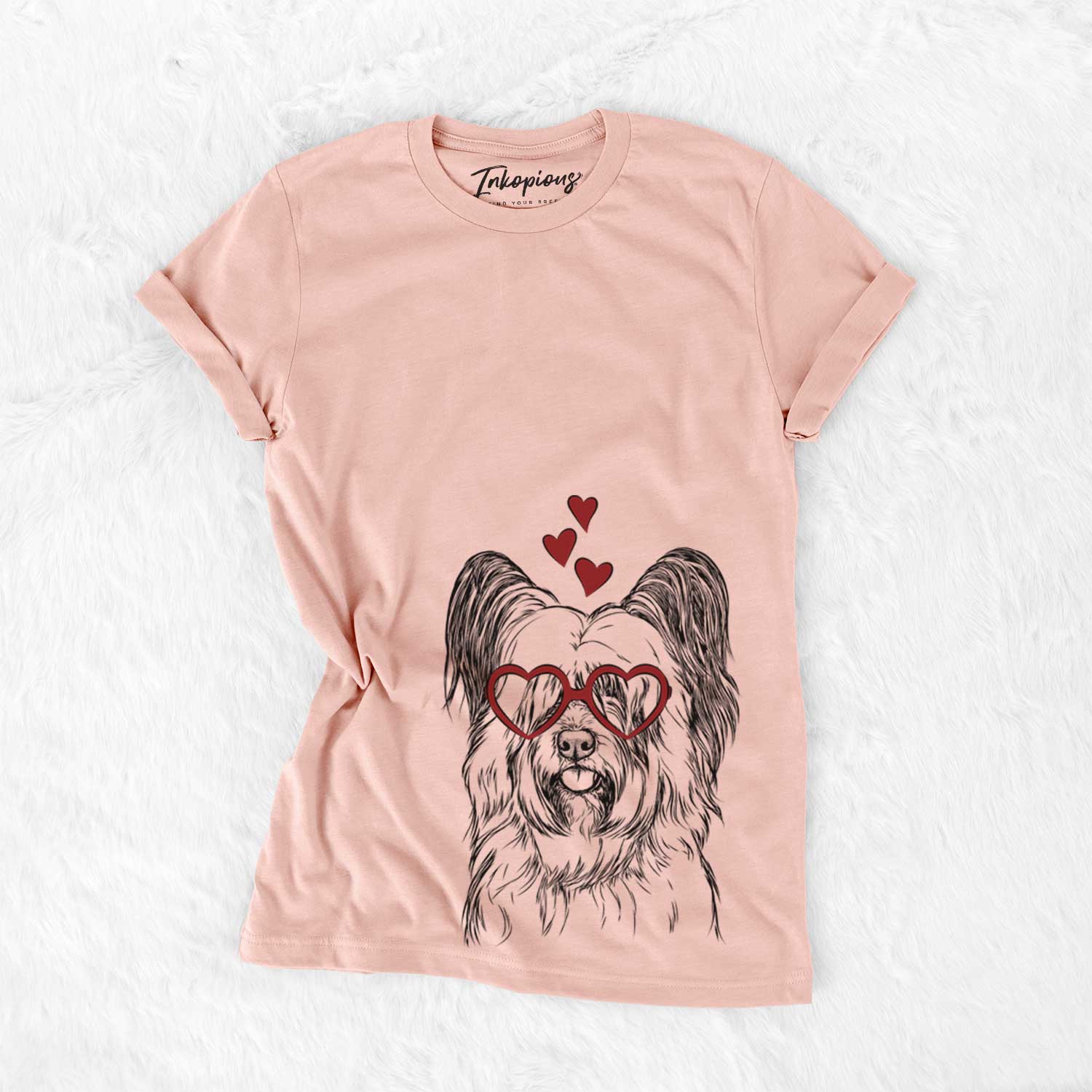 Hand-drawn sketch of Gideon the Skye Terrier wearing heart-shaped glasses on a Peach Bella Canvas Unisex Crewneck