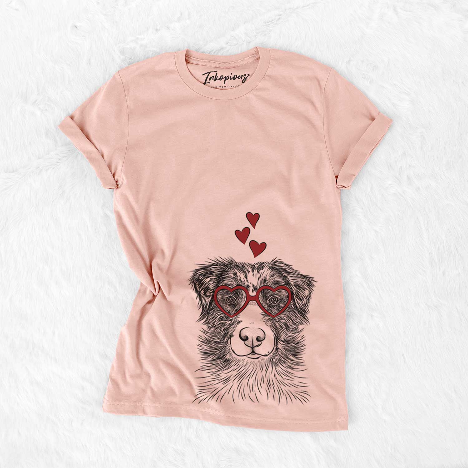 Hand-drawn sketch of Gram the Australian Shepherd wearing heart-shaped glasses on a Peach Bella Canvas Unisex Crewneck