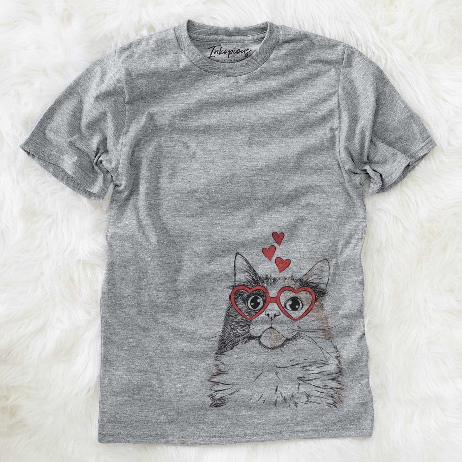 Hand-drawn sketch of Greta the Calico Cat wearing heart-shaped glasses on a Grey Unisex crewneck