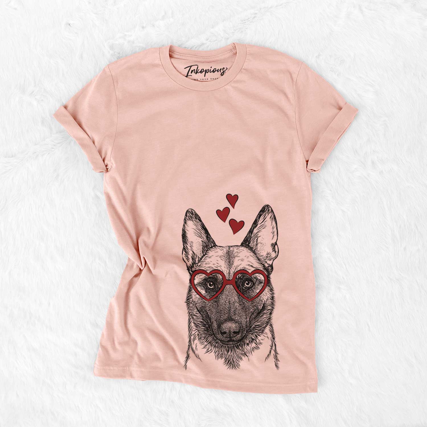 Hand-drawn sketch of Gunther the Belgian Malinois wearing heart-shaped glasses on a Peach Bella Canvas Unisex Crewneck