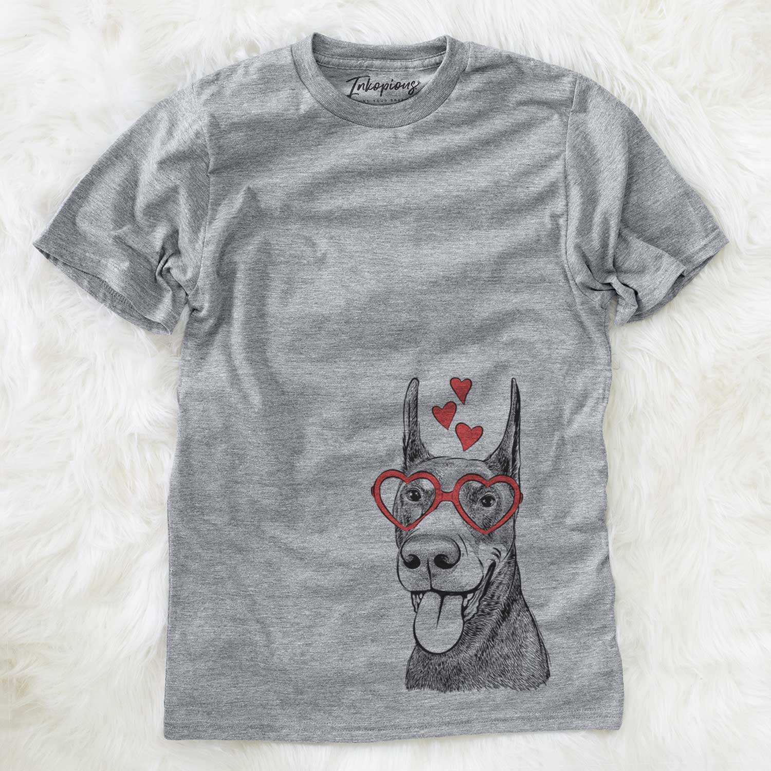 Hand-drawn sketch of Happy Sunny the Doberman Pinscher wearing heart-shaped glasses on a Grey Unisex crewneck