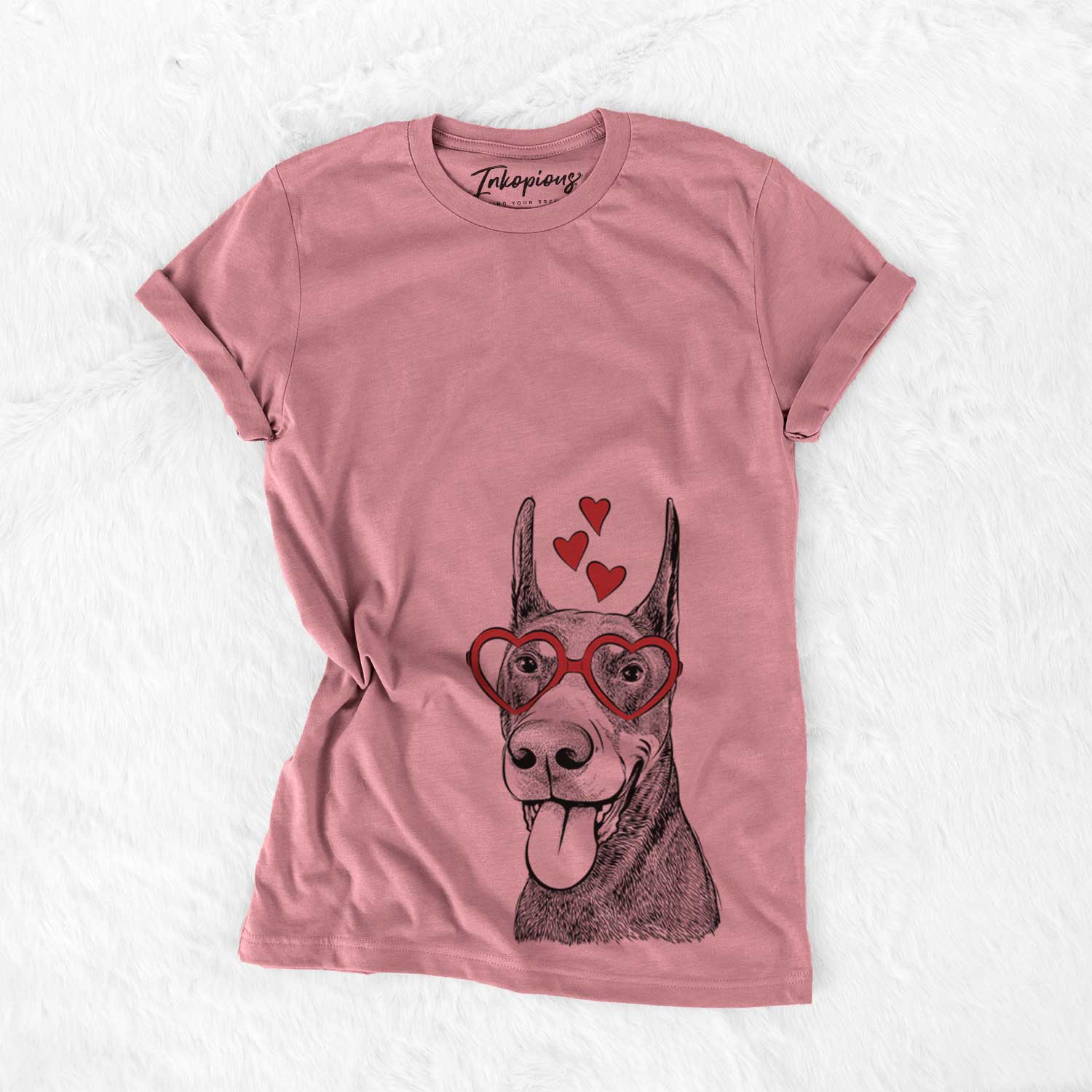 Hand-drawn sketch of Happy Sunny the Doberman Pinscher wearing heart-shaped glasses on a Mauve Bella Canvas Unisex Crewneck