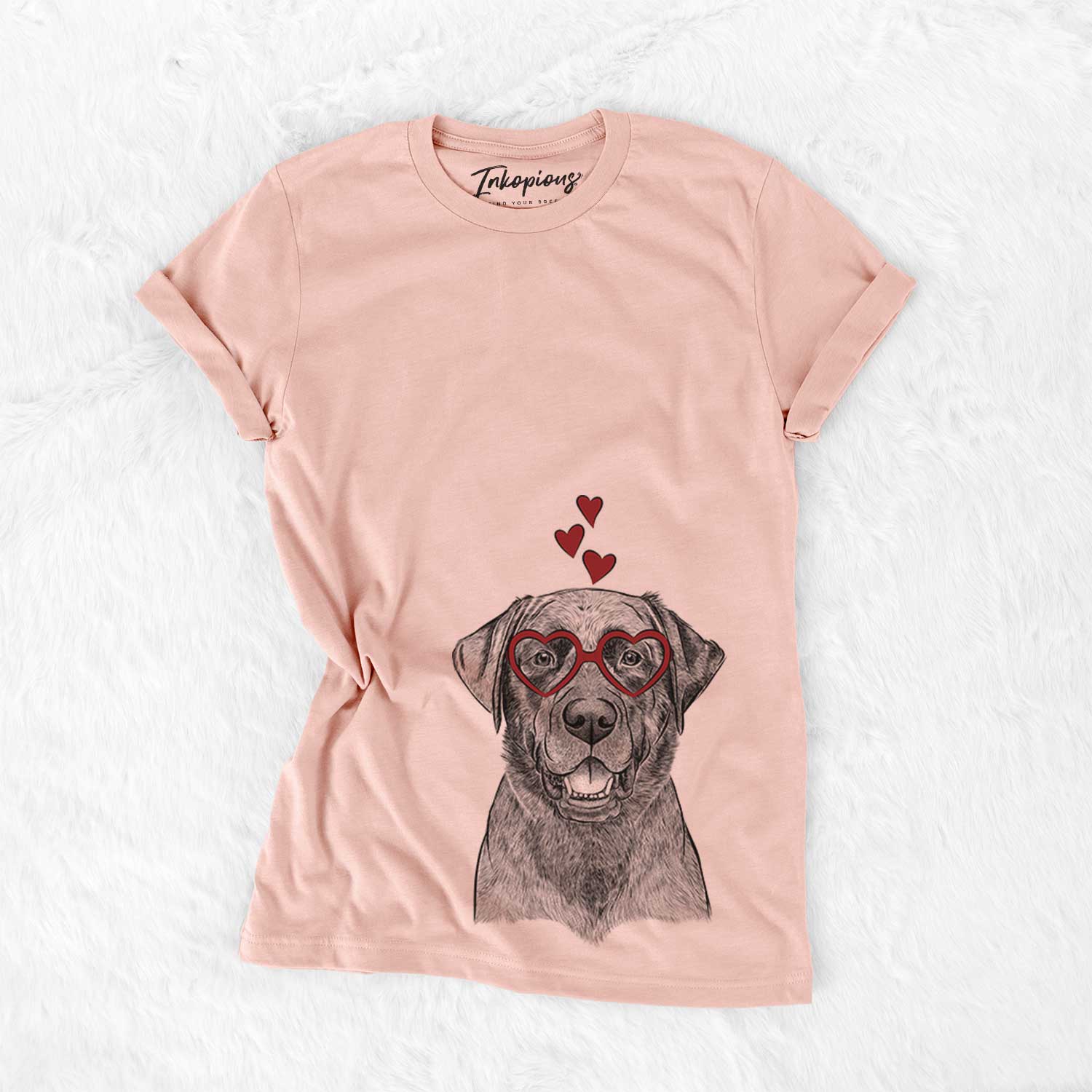 Hand-drawn sketch of Heath the Black Lab wearing heart-shaped glasses on a Peach Bella Canvas Unisex Crewneck