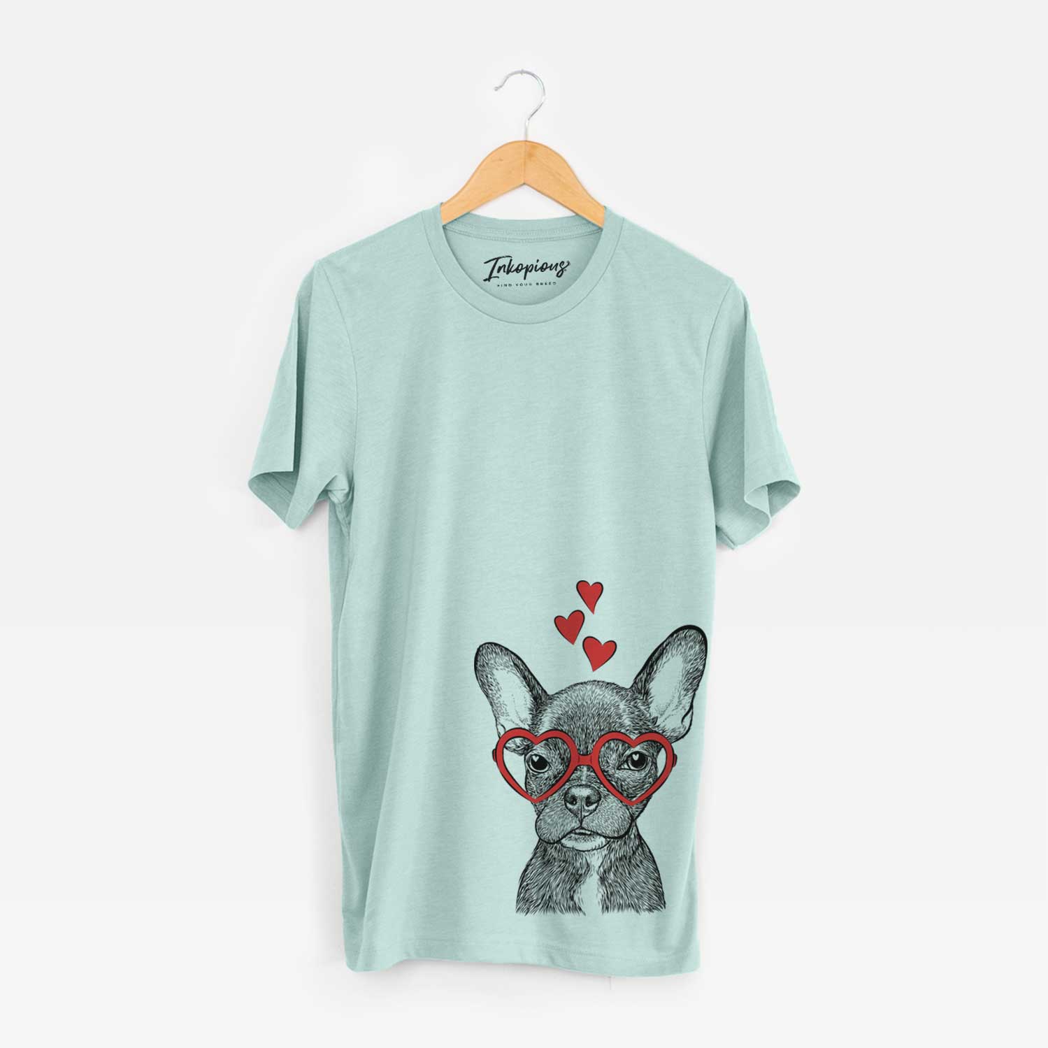 Hand-drawn sketch of Henry the French Bulldog wearing heart-shaped glasses on a Heather Sage Unisex crewneck