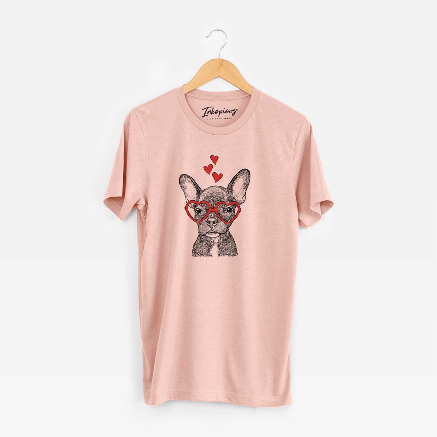 Hand-drawn sketch of Henry the French Bulldog wearing heart-shaped glasses on a Peach Unisex crewneck