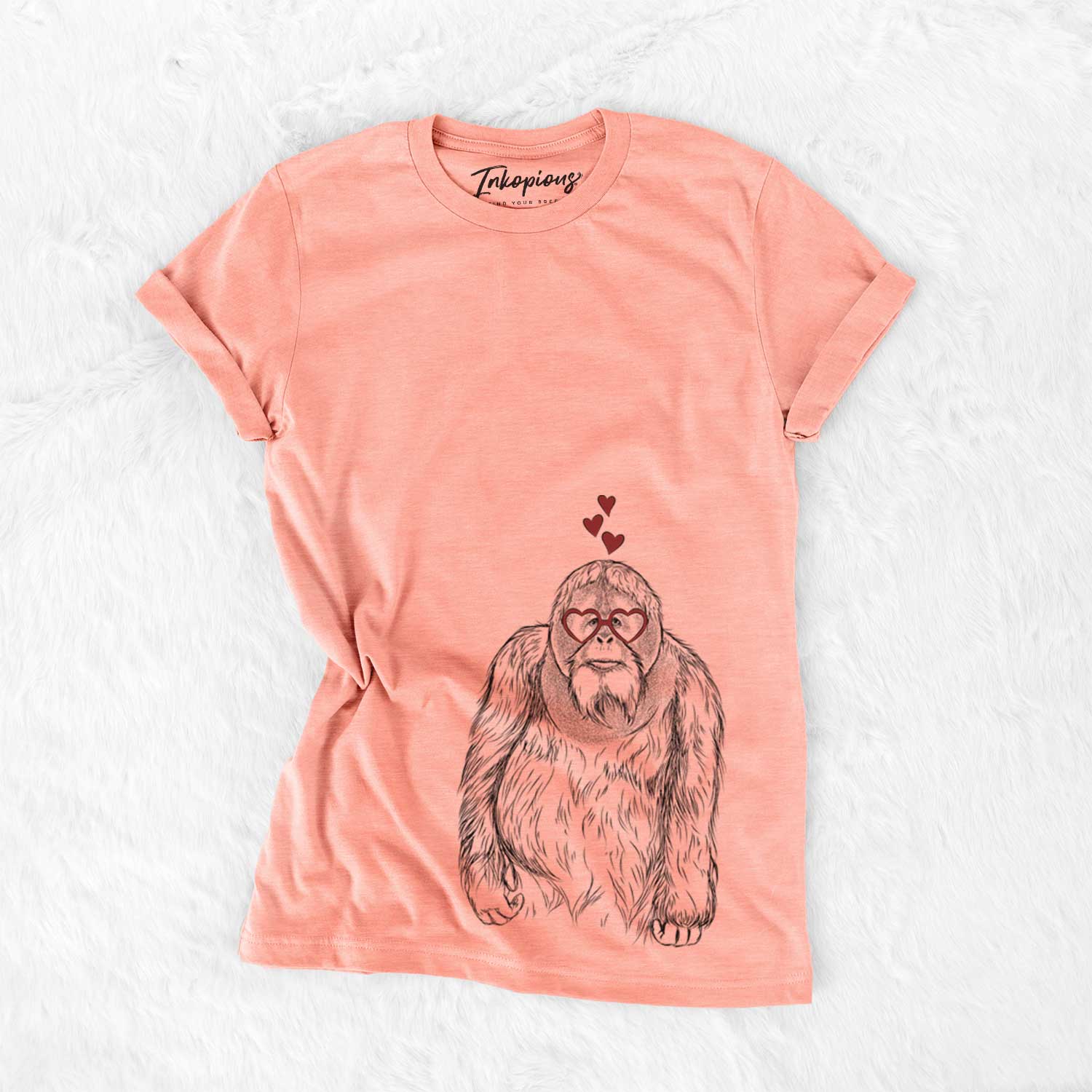 Hand-drawn sketch of Horace the Male Orangutan wearing heart-shaped glasses on a Sunset Bella Canvas Unisex Crewneck