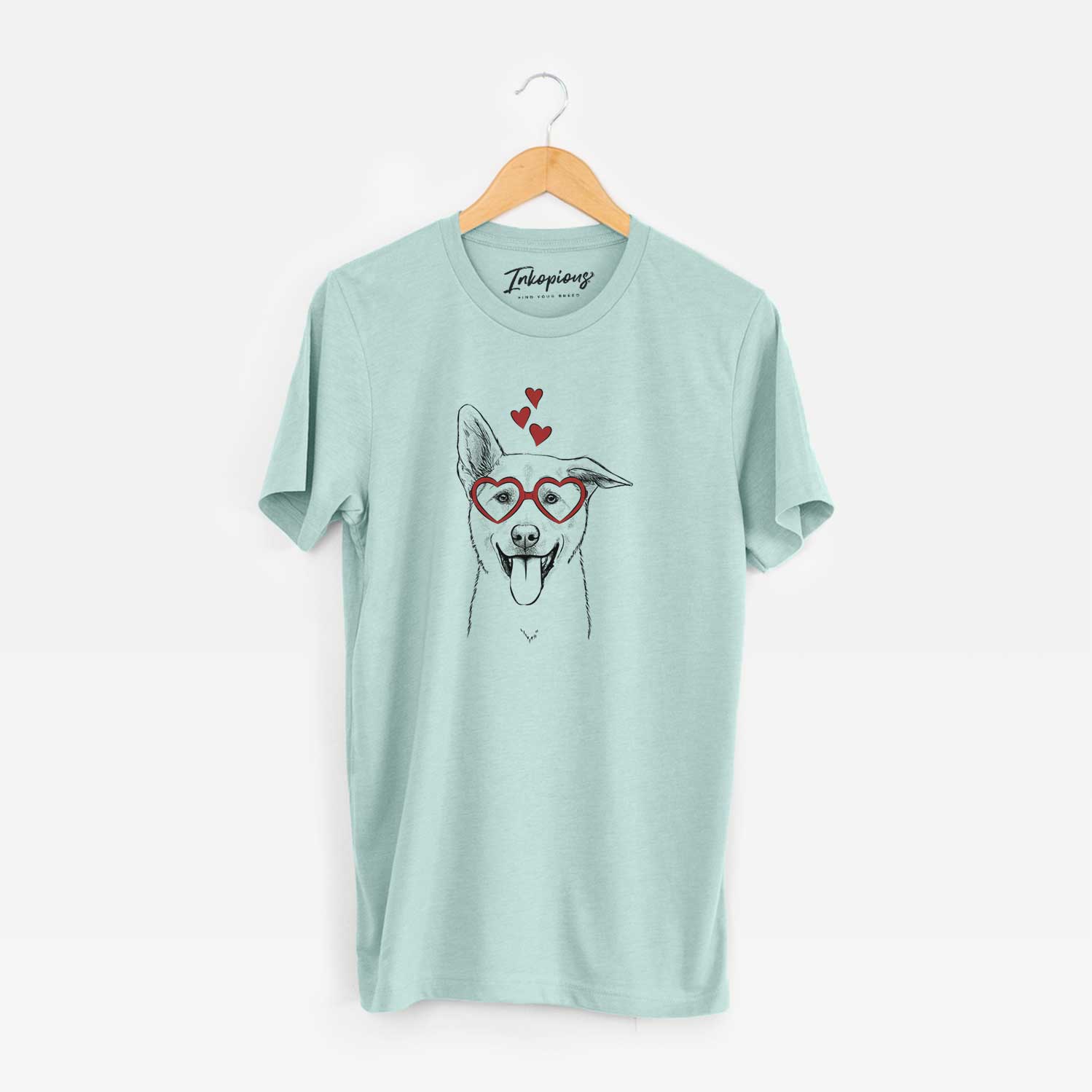Hand-drawn sketch of Hoya the Korean Jindo wearing heart-shaped glasses on a Heather Sage Unisex crewneck