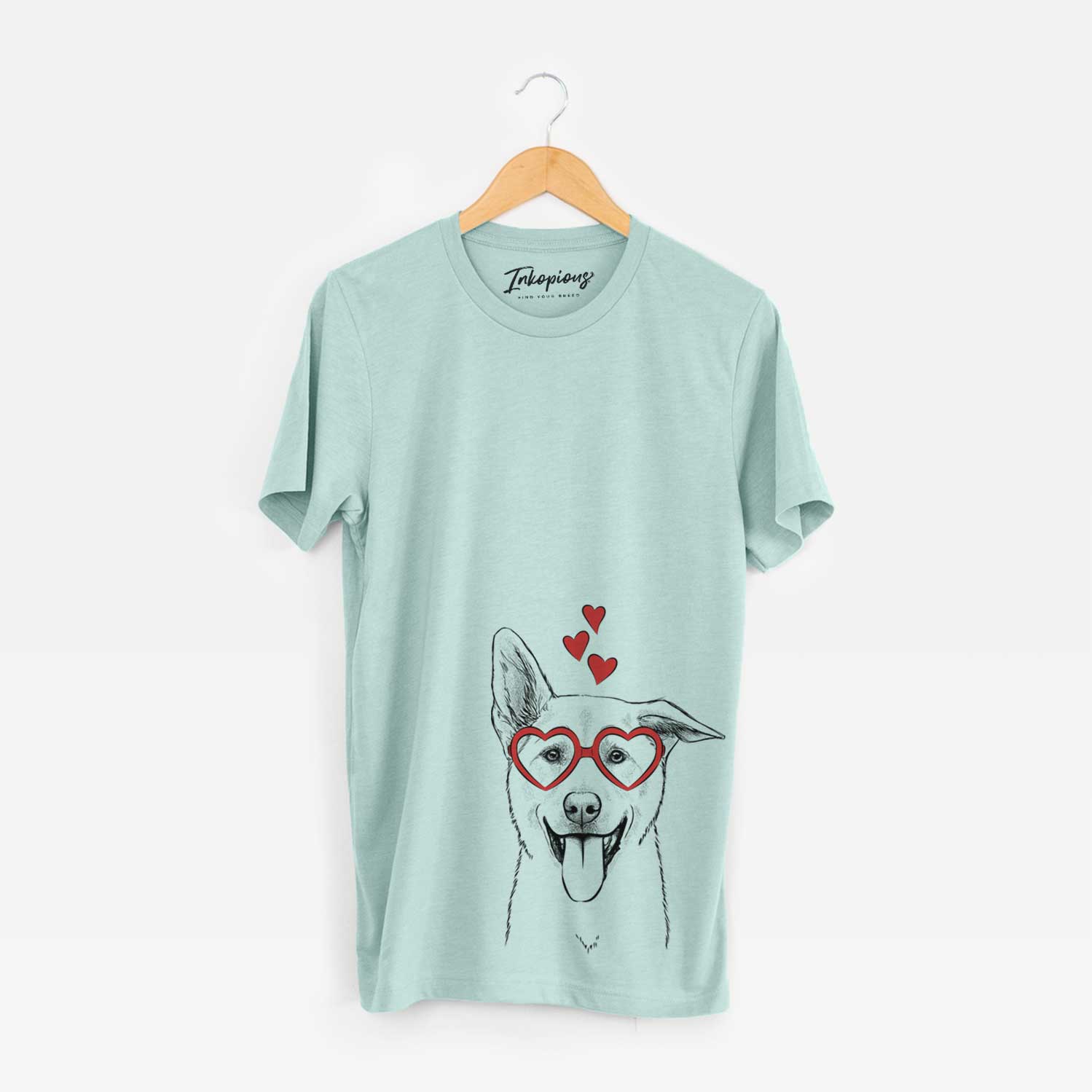 Hand-drawn sketch of Hoya the Korean Jindo wearing heart-shaped glasses on a Heather Sage Unisex crewneck