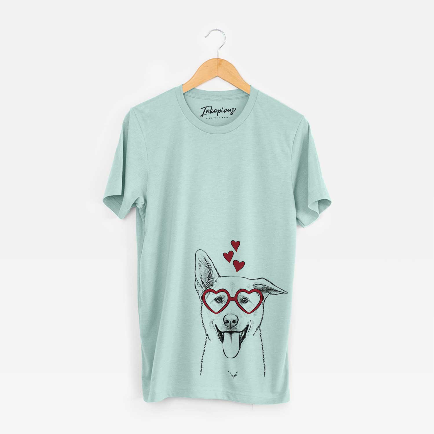 Hand-drawn sketch of Hoya the Korean Jindo wearing heart-shaped glasses on a Heather Sage Bella Canvas Unisex Crewneck