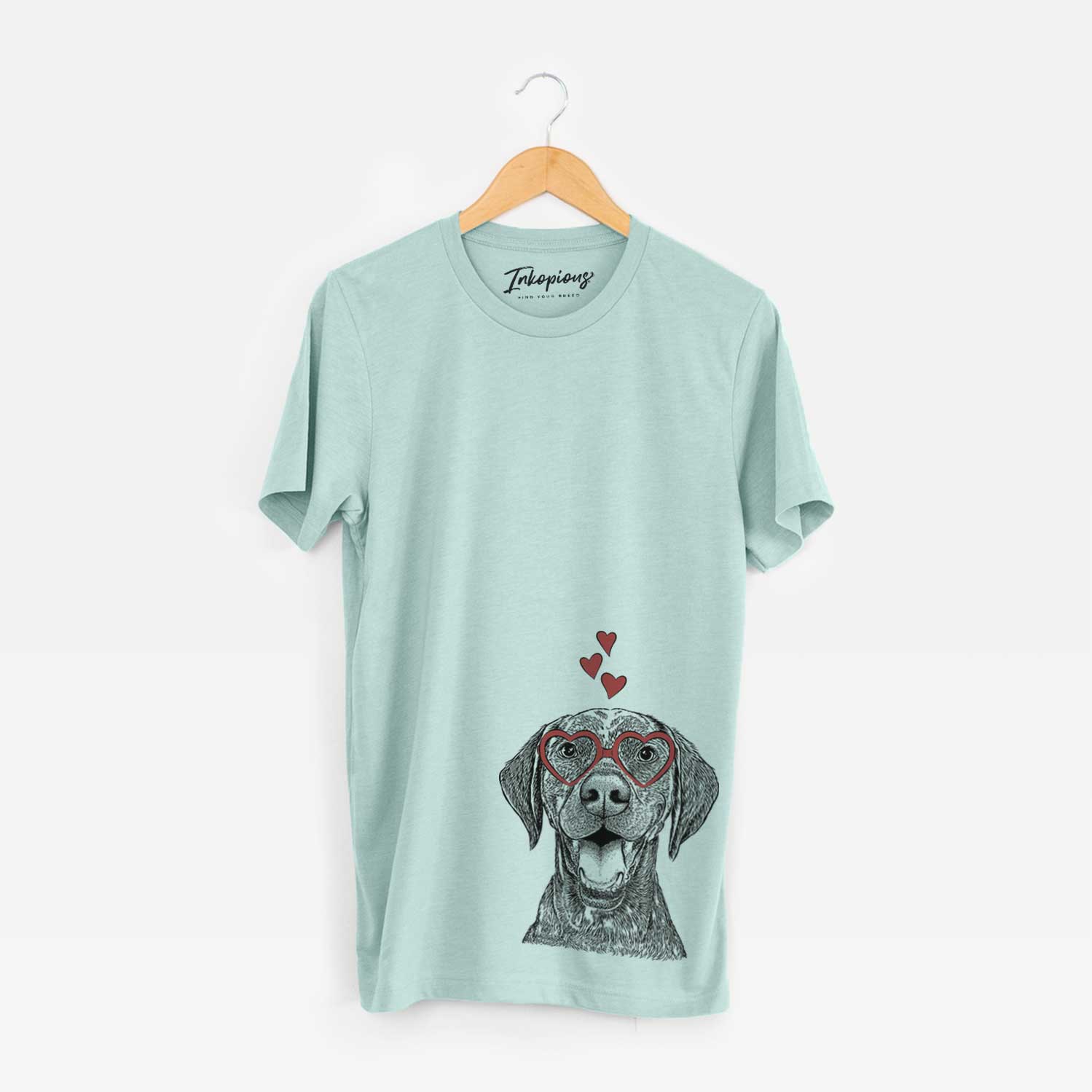 Hand-drawn sketch of Hudson the German Shorthaired Pointer wearing heart-shaped glasses on a Heather Sage Unisex crewneck