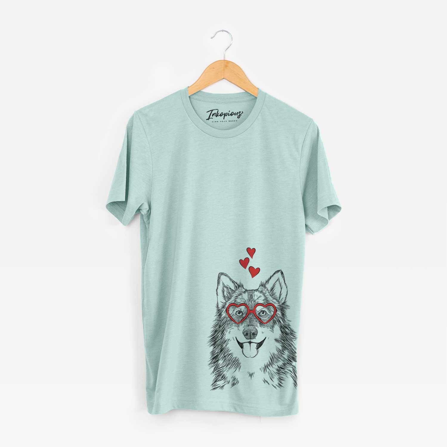 Hand-drawn sketch of Iben the Utonagan wearing heart-shaped glasses on a Heather Sage Unisex crewneck