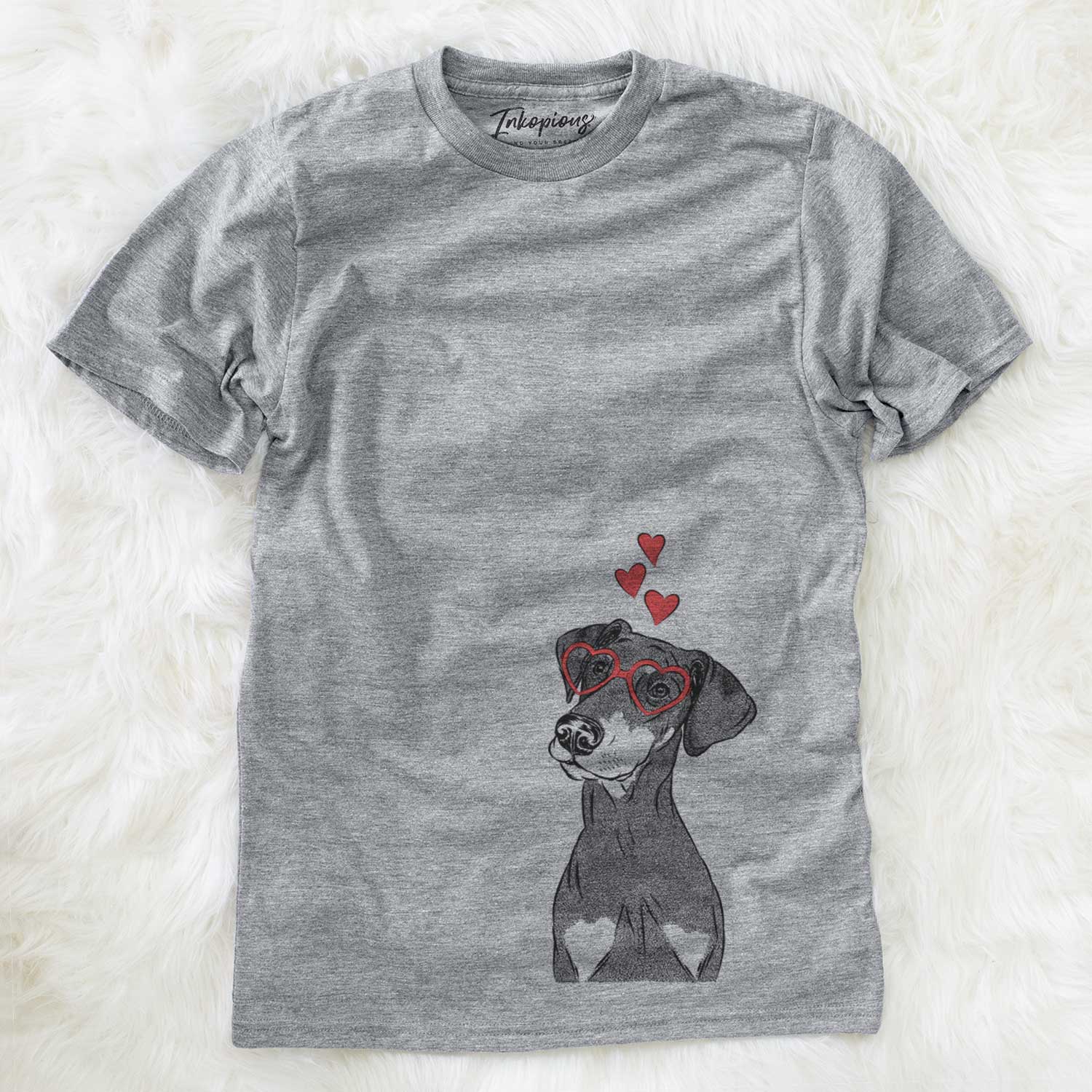 Hand-drawn sketch of Iroh the Doberman Pinscher wearing heart-shaped glasses on a Grey Unisex crewneck