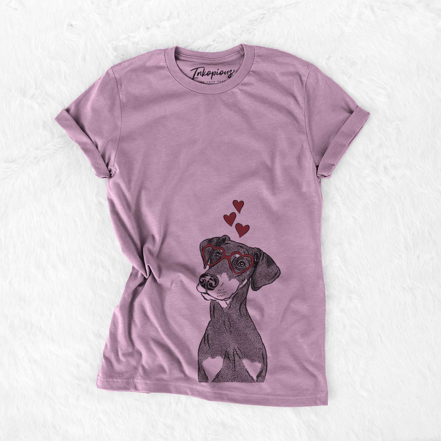 Hand-drawn sketch of Iroh the Doberman Pinscher wearing heart-shaped glasses on an Orchid Bella Canvas Unisex Crewneck